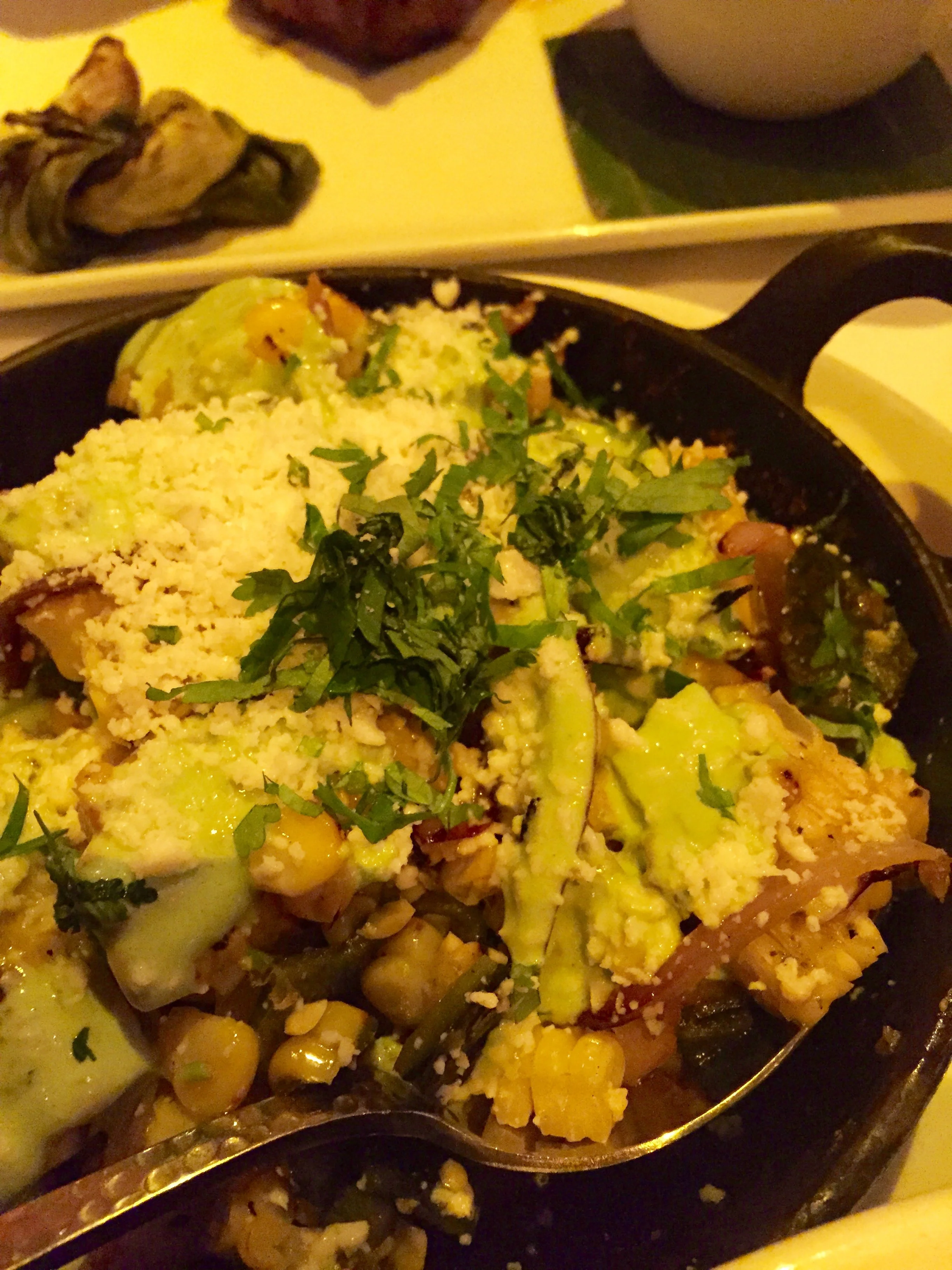 Mexican Street Corn, deconstructed with cotija, and serrano-cilantro crema.