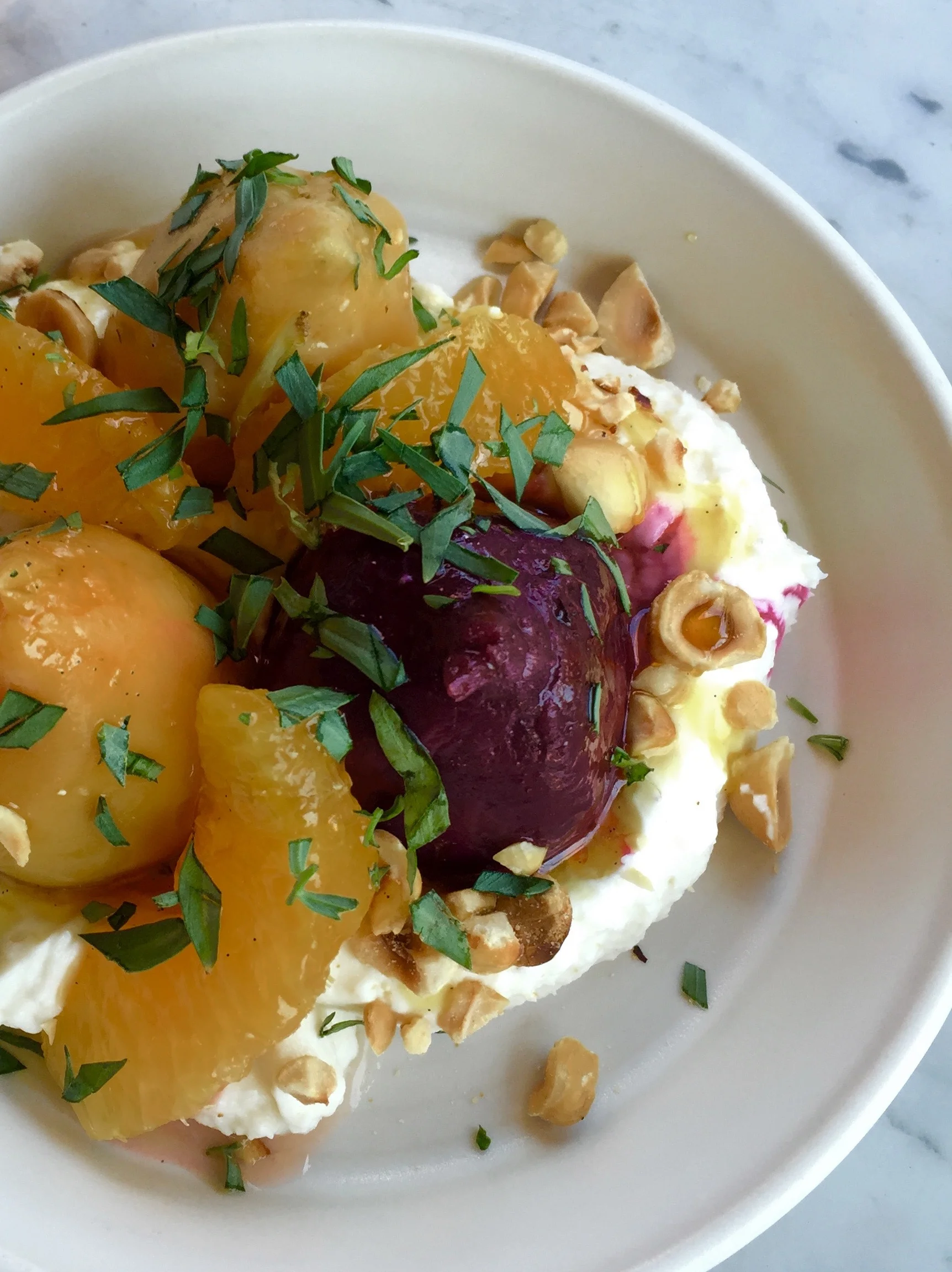 Baby beets, orange. tarragon, ricotta cream, hazelnuts, and vanilla.