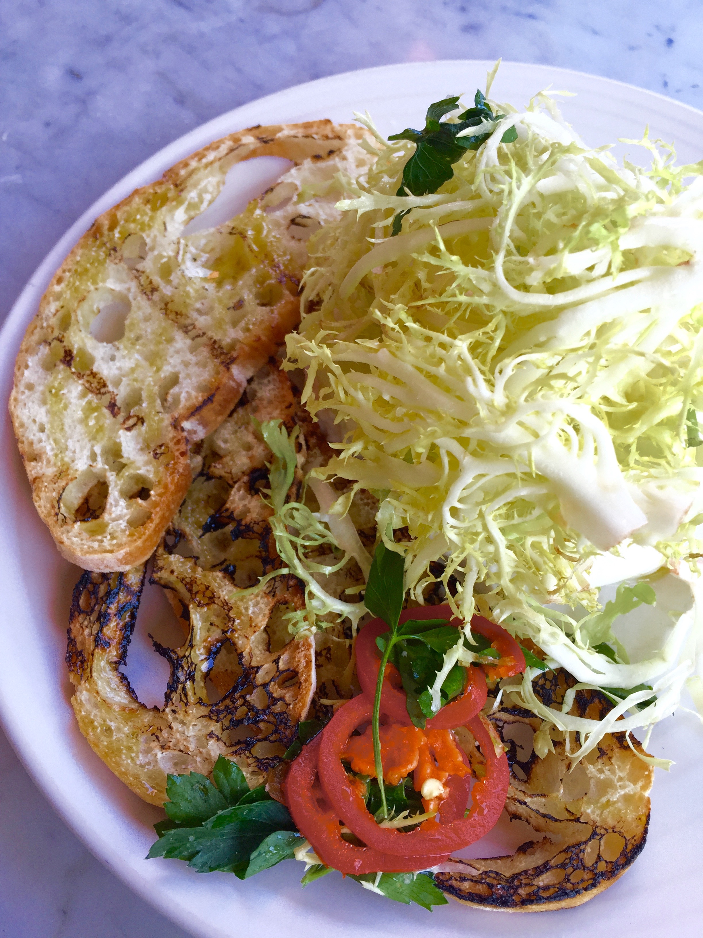 Burrata, farmer's market melon, frisee, basil, and pickled chili.