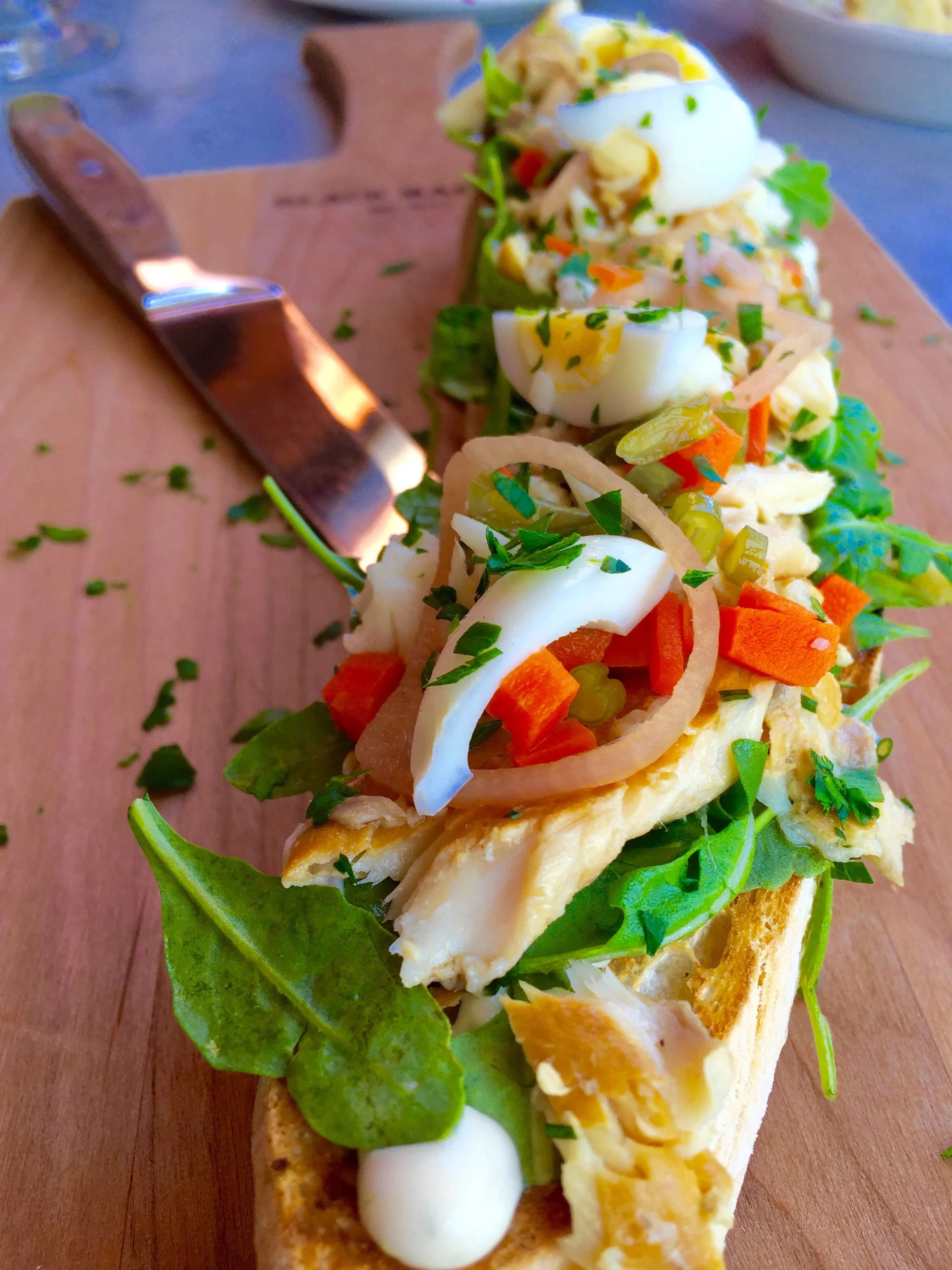 Smoked trout on ciabatta with picked veg and egg.