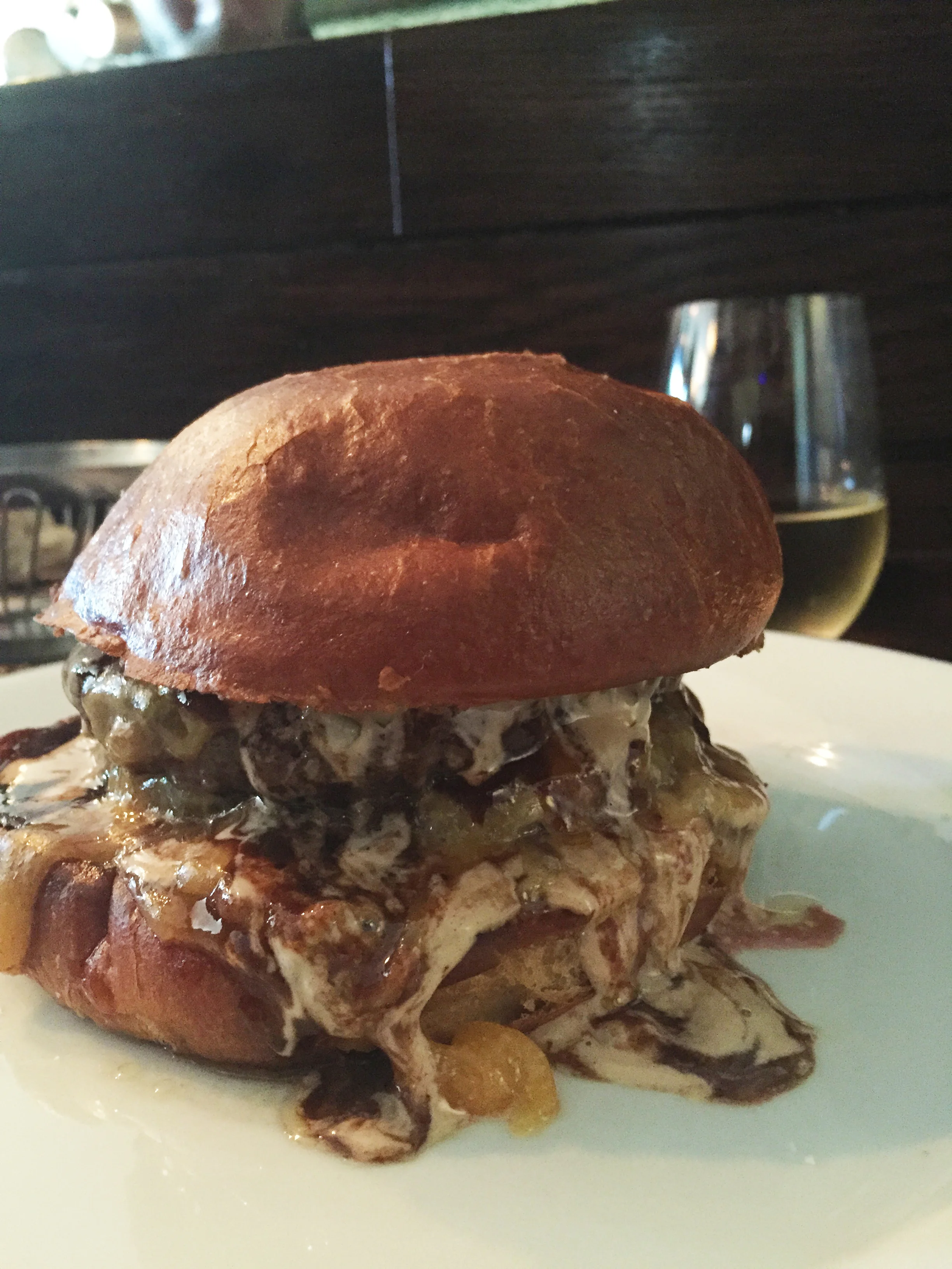 The Big Mec, with two prime beef patties, caramelized onions, garlic aioli, American cheese, and red wine bordelaise.