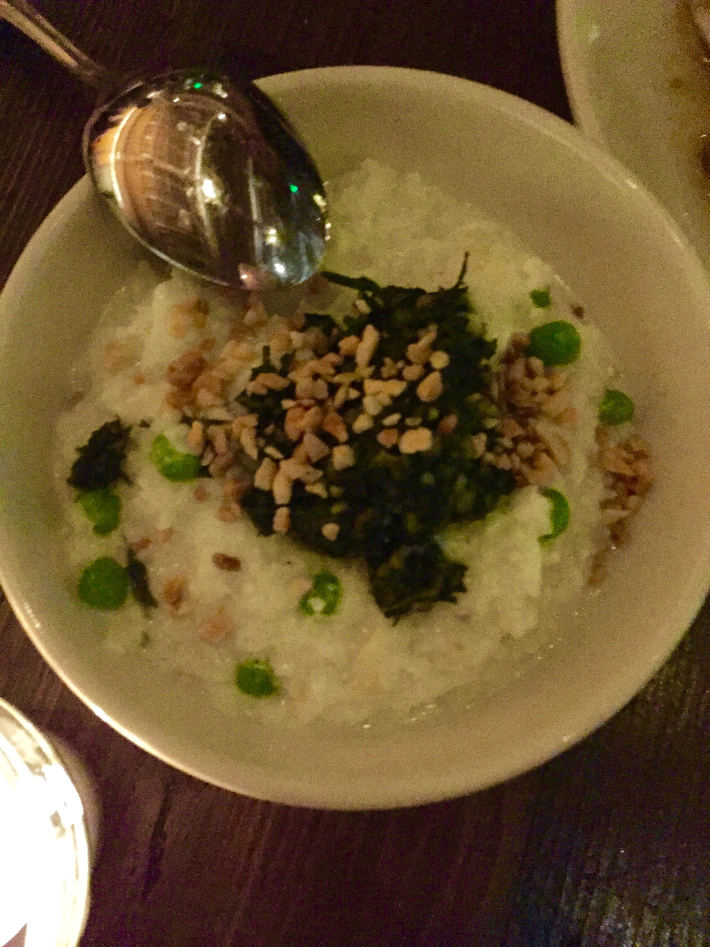 Creamy cauliflower with millet, English peas, and almond-tarragon pesto.