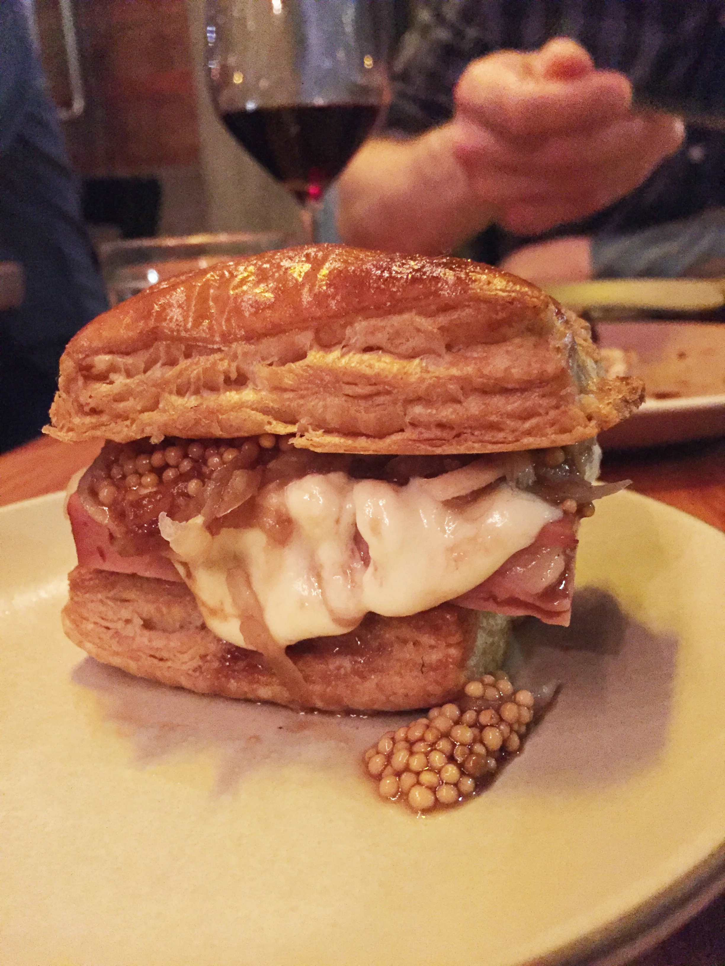 Pig in a Blanket with mortadella, spelt pastry, brovada, and stracchino.