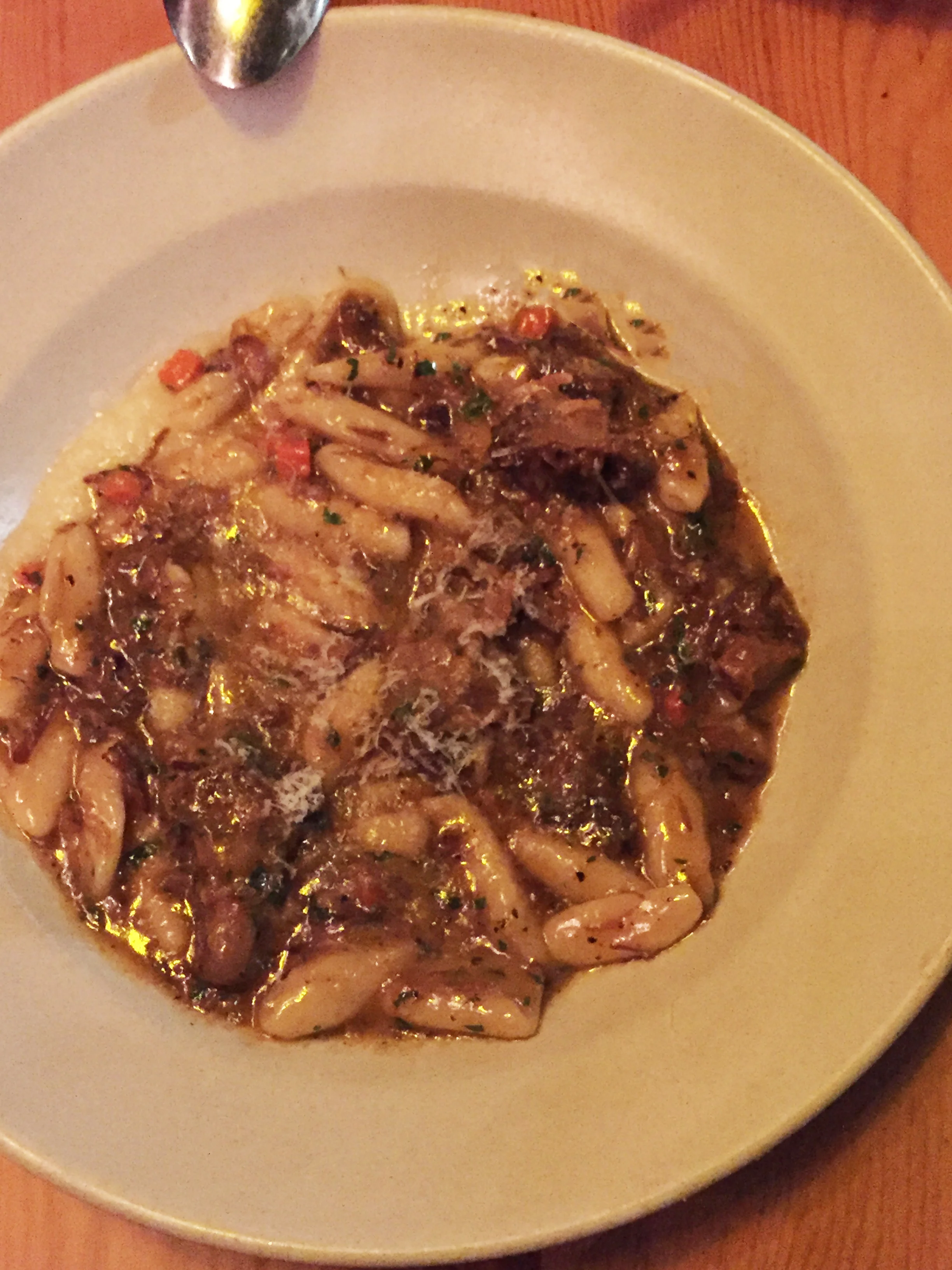 Gnòc with oxtail, marrow, and potato. 