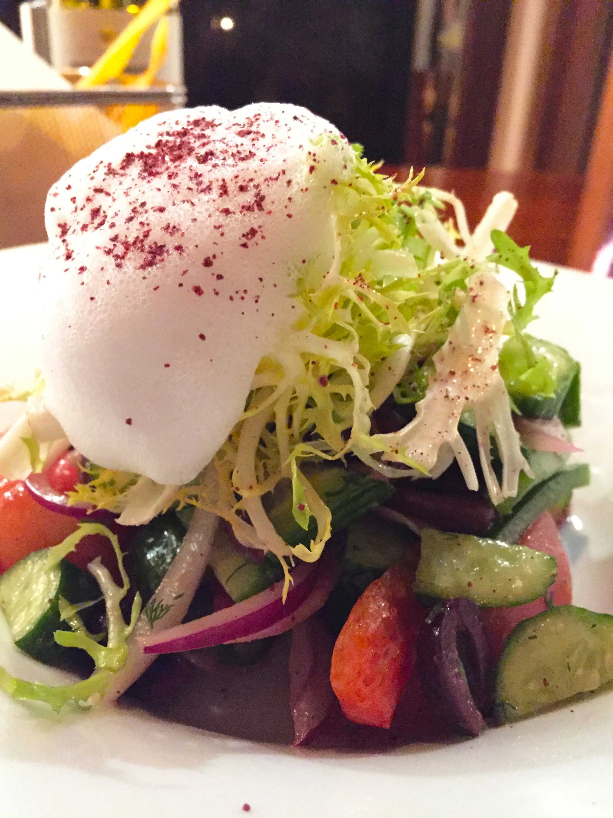 "Fattoush Salad" with Persian cucumbers, heirloom tomatoes, peppers, feta cheese, onions, and lemon-sumac dressing.