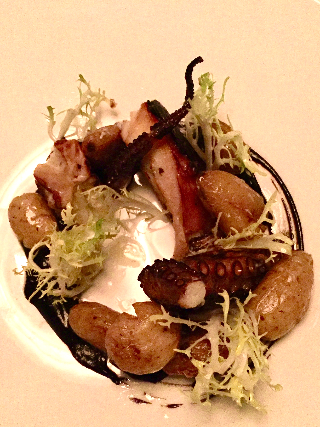 grilled octopus with new potato & black garlic