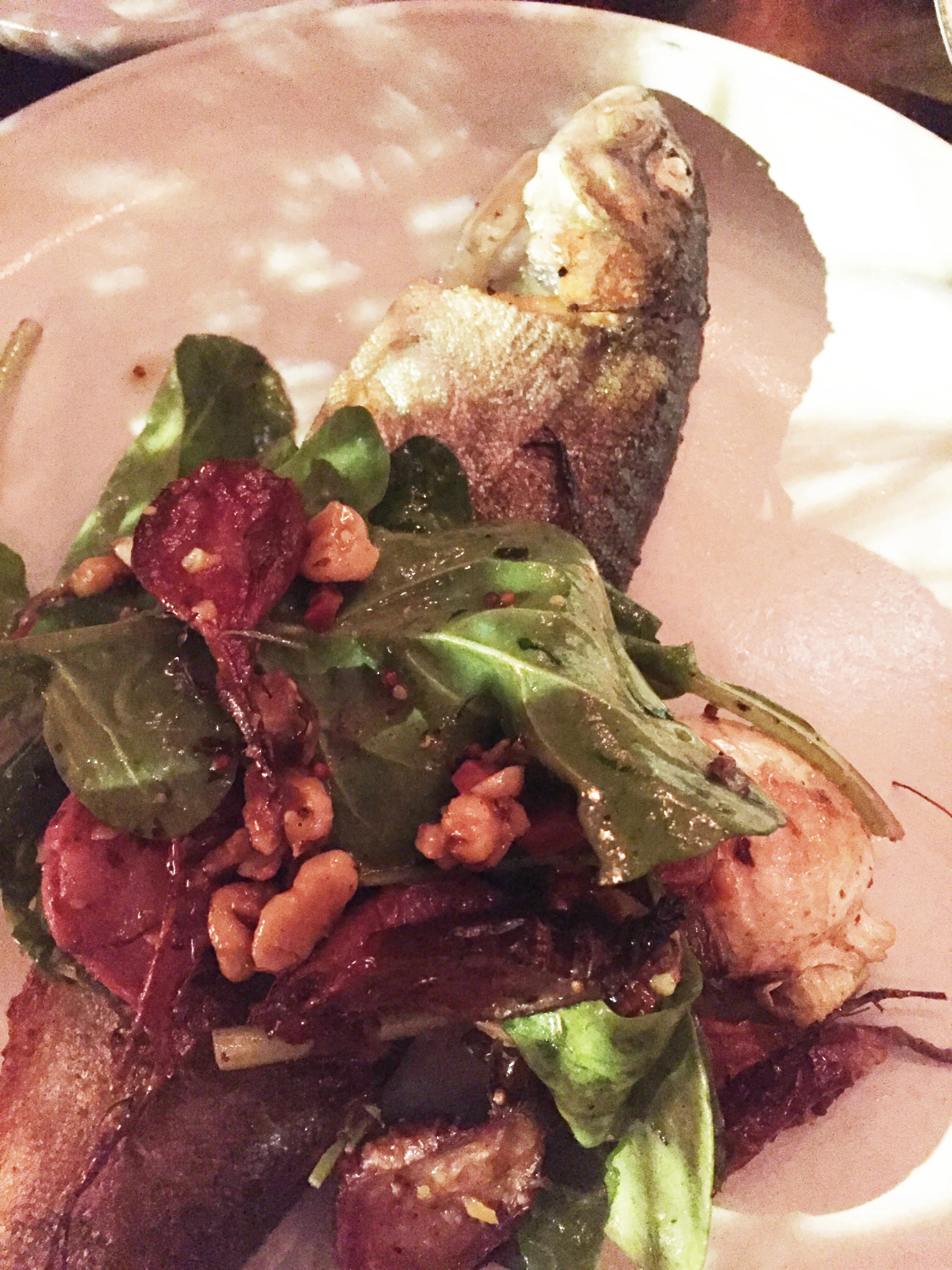 Cast iron-roasted ruby trout, roasted turnips, country ham vinagrette, arugula, walnut.