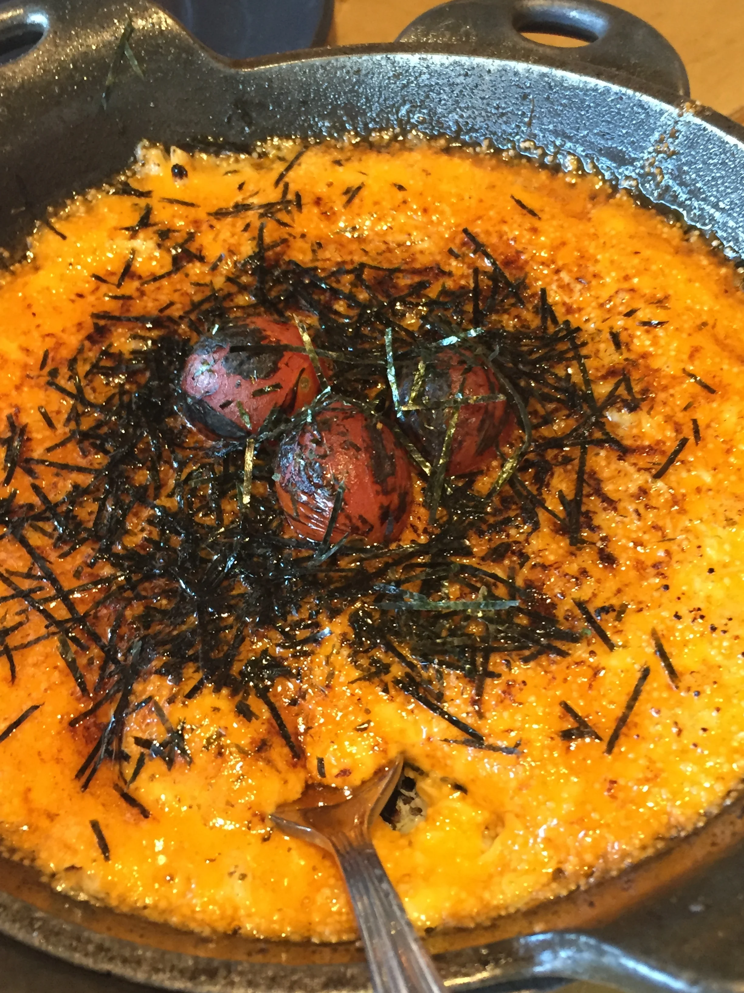 BAKED CRAB DIP - dynamite sauce, masago, charred tomato, nori, toast.