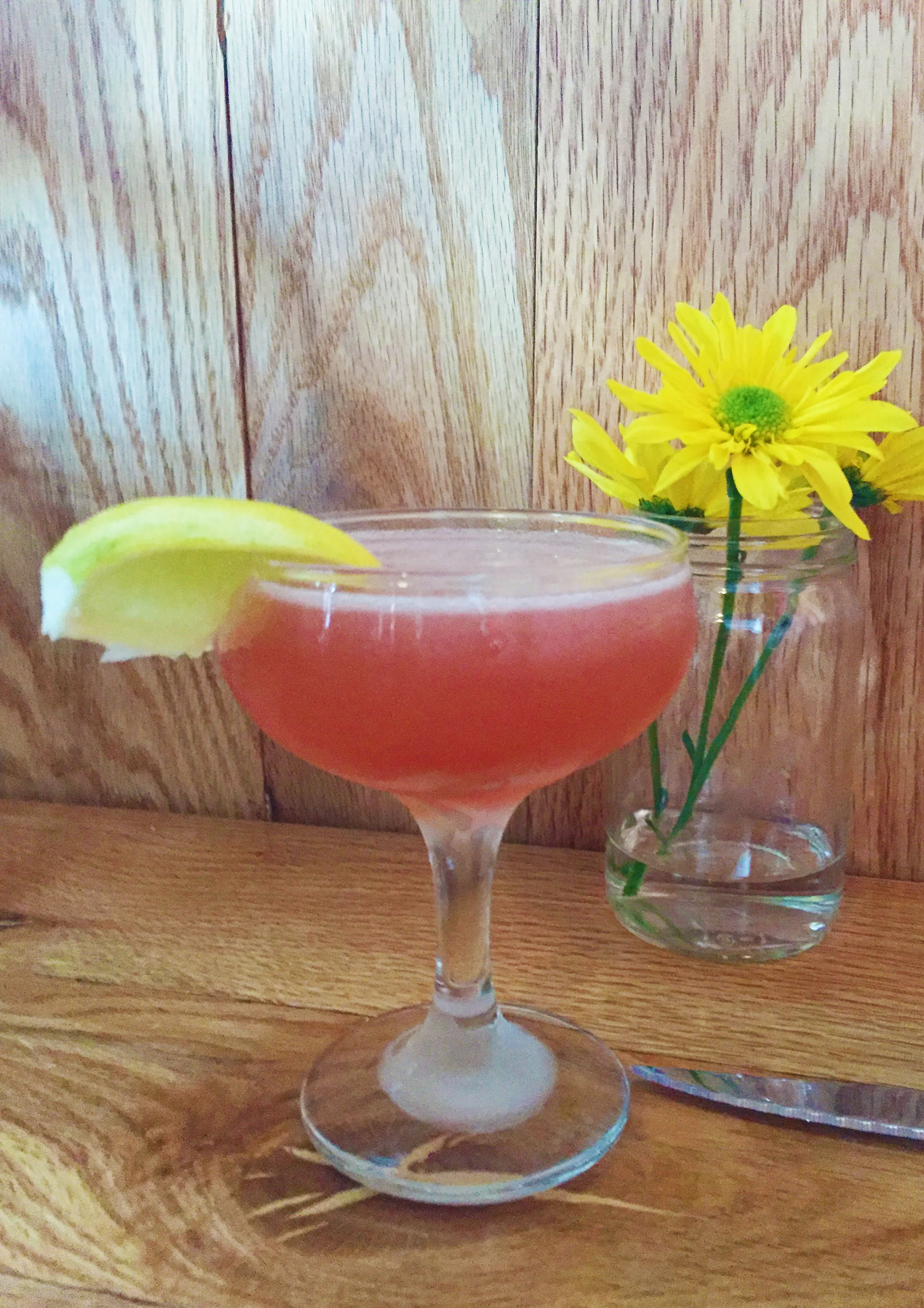 Tequila, grenadine, and orange water cocktail.