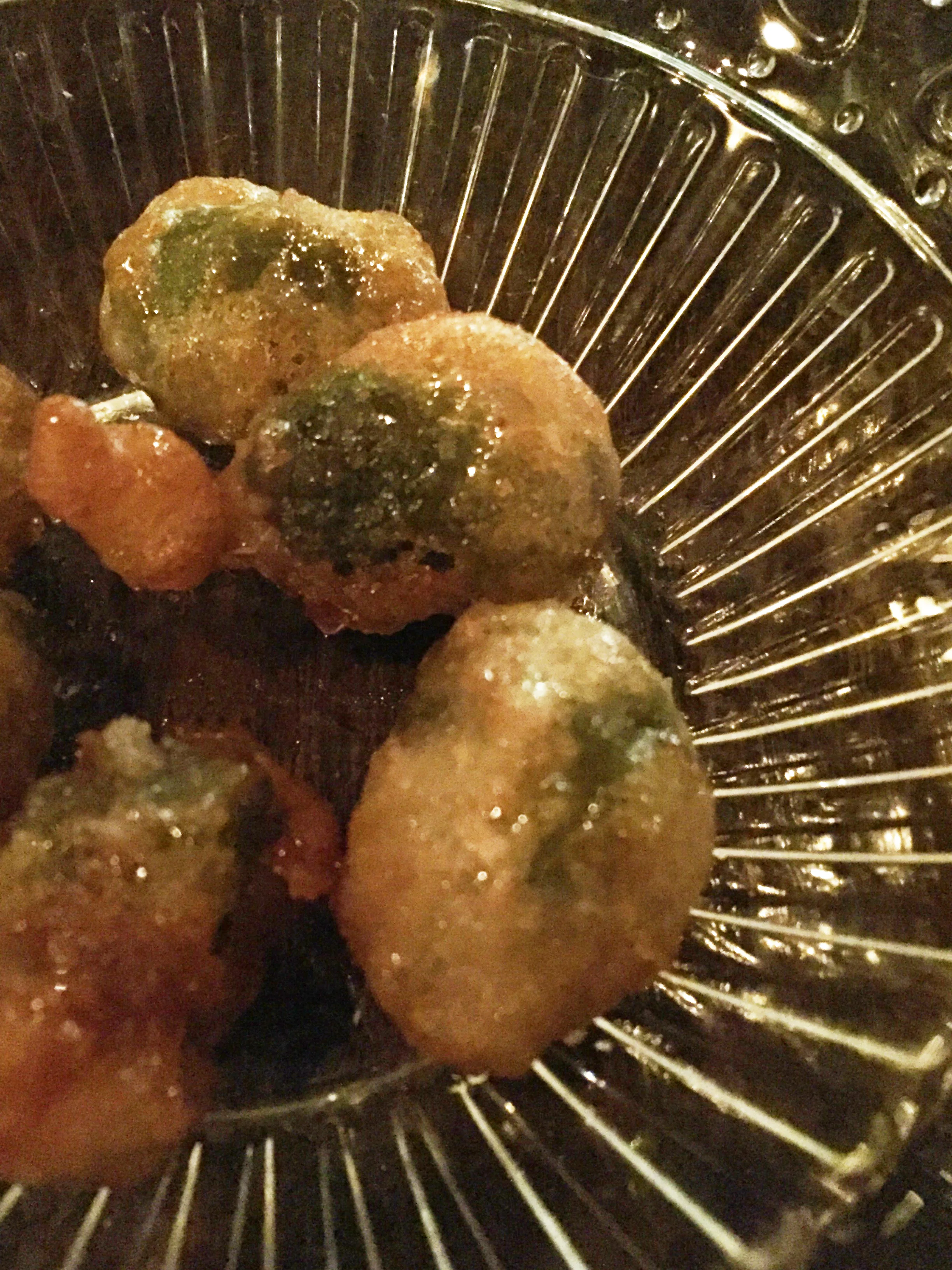 Fried olives stuffed with sweet potato and kalamata purée