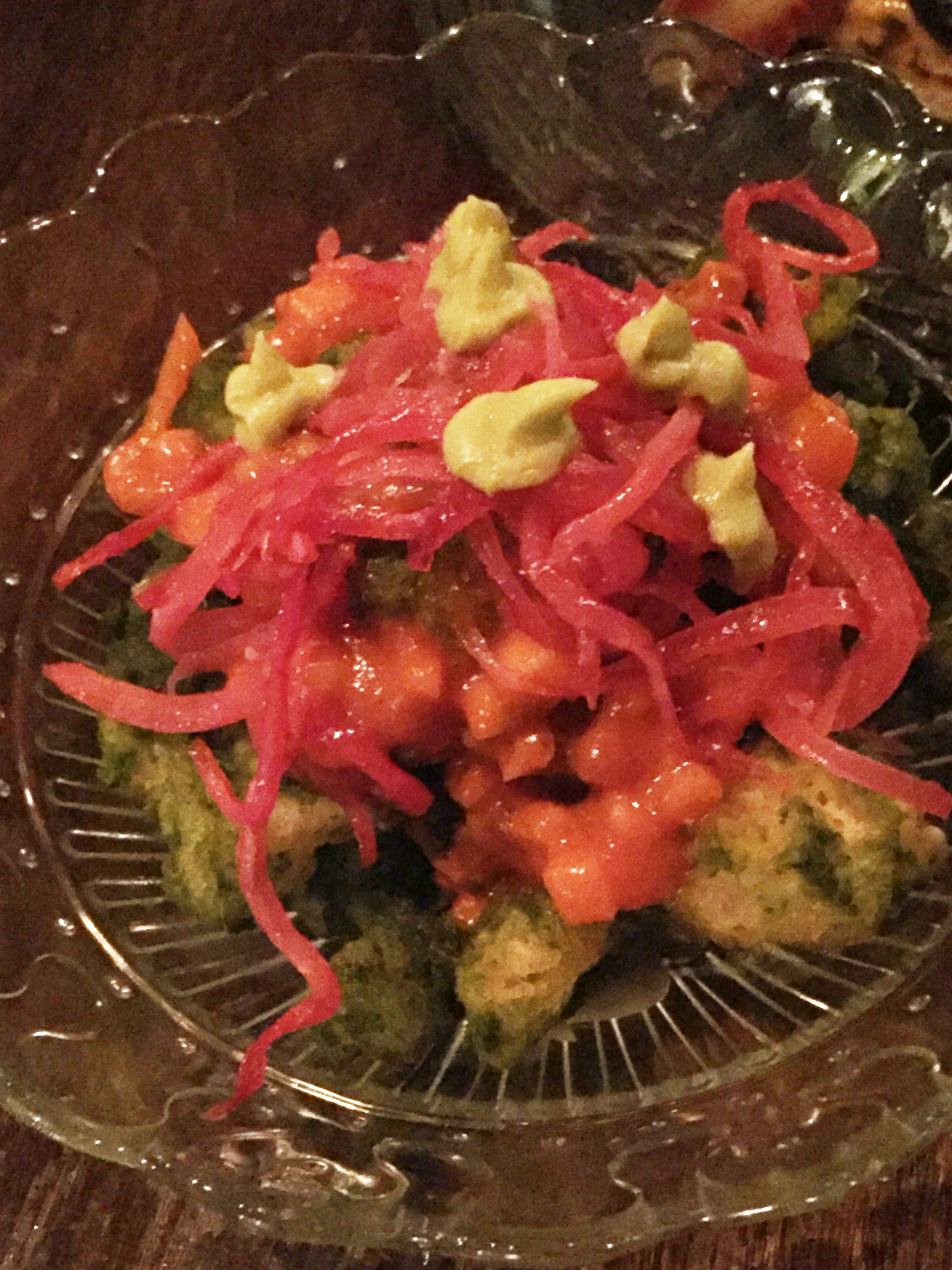 Crisp Yucca with chimichurri, pickled red onions, red bell pepper, and avocado mousse.