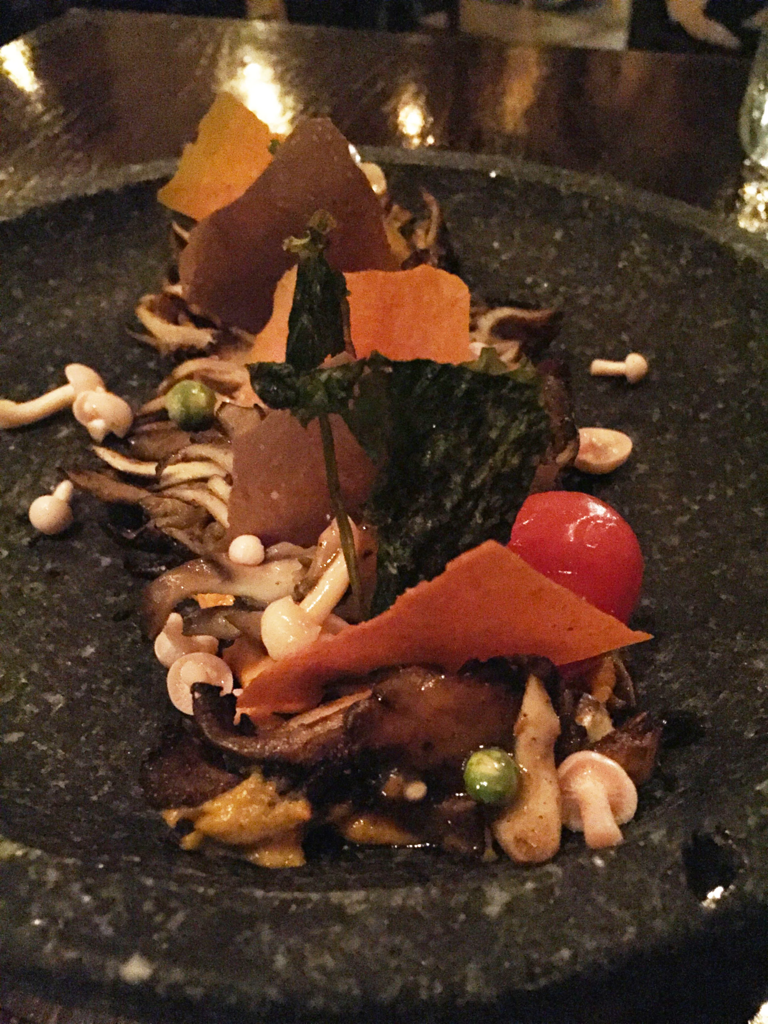 Mushrooms with burnt sweet potato - torched sweet potato purée with nutmeg and cinnamon topped with a ragu of shimeji and cremini mushrooms; with pea tendrils, grape tomatoes, arugula, cremini chips, and pan-roasted maitake mushrooms seasoned with shwarma spices.