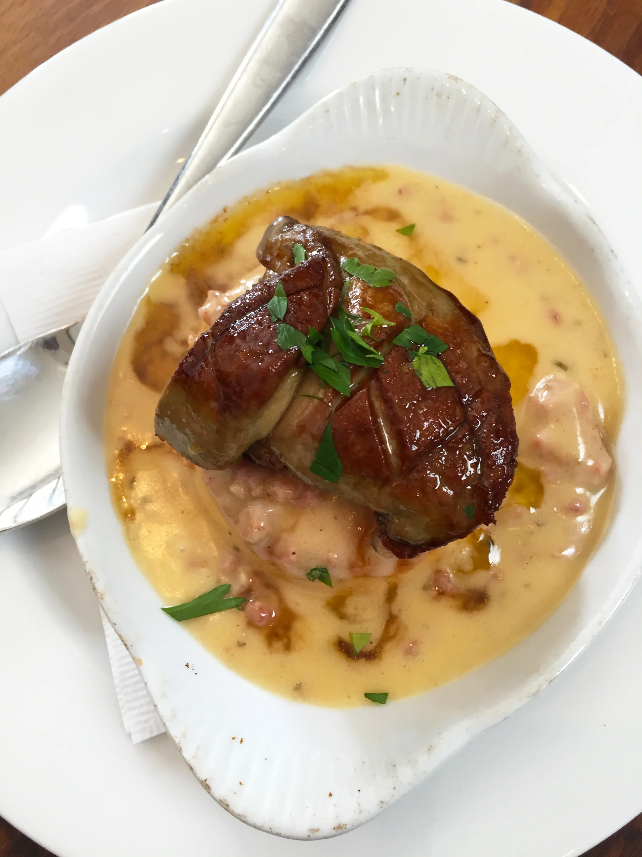 Foie gras, biscuit, and maple sausage gravy.