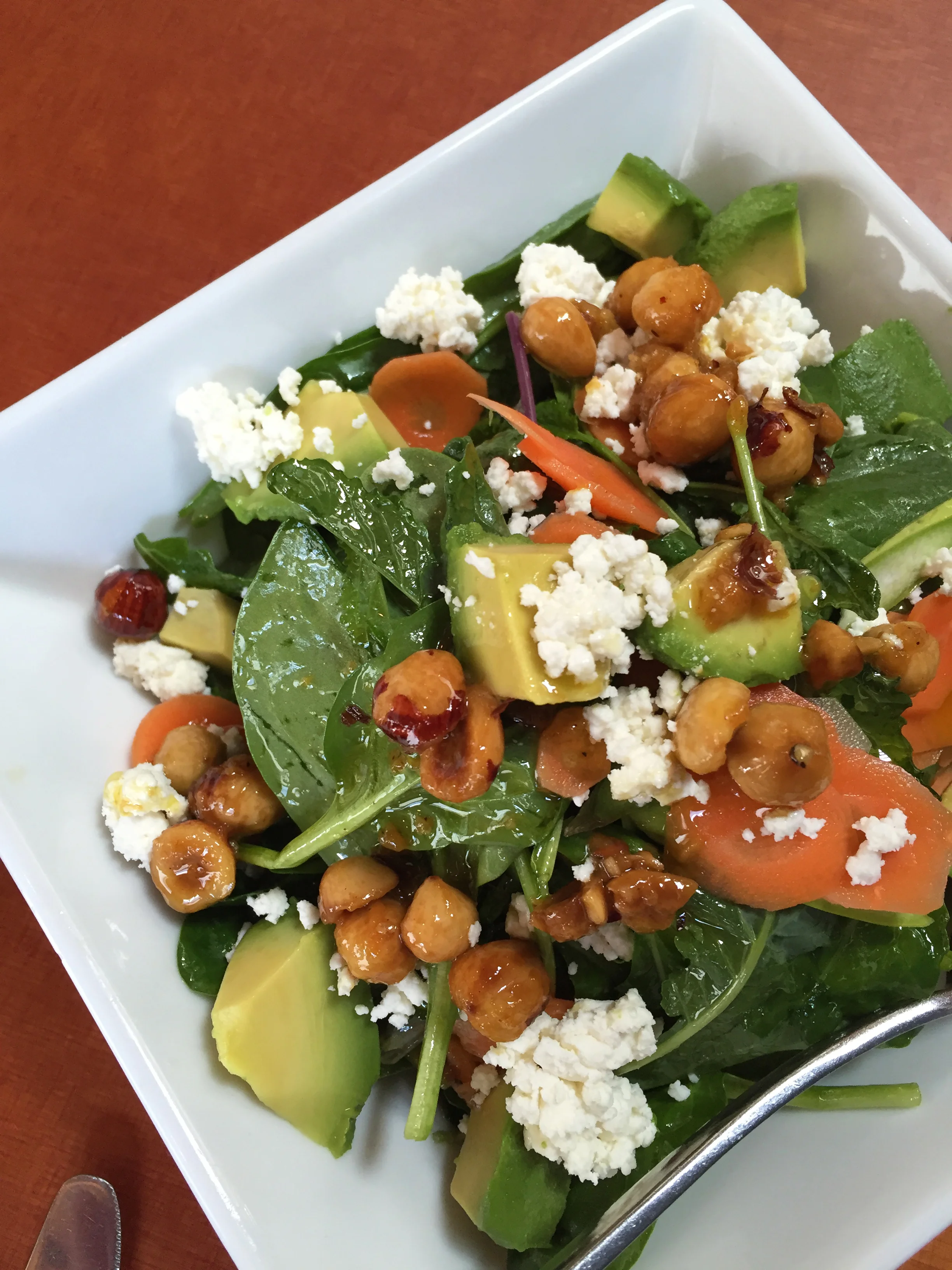 ASPARAGUS & MARKET BABY GREENS with hazelnut aillade, avocado, pickled carrots, feta, mint, lemon vinaigrette 