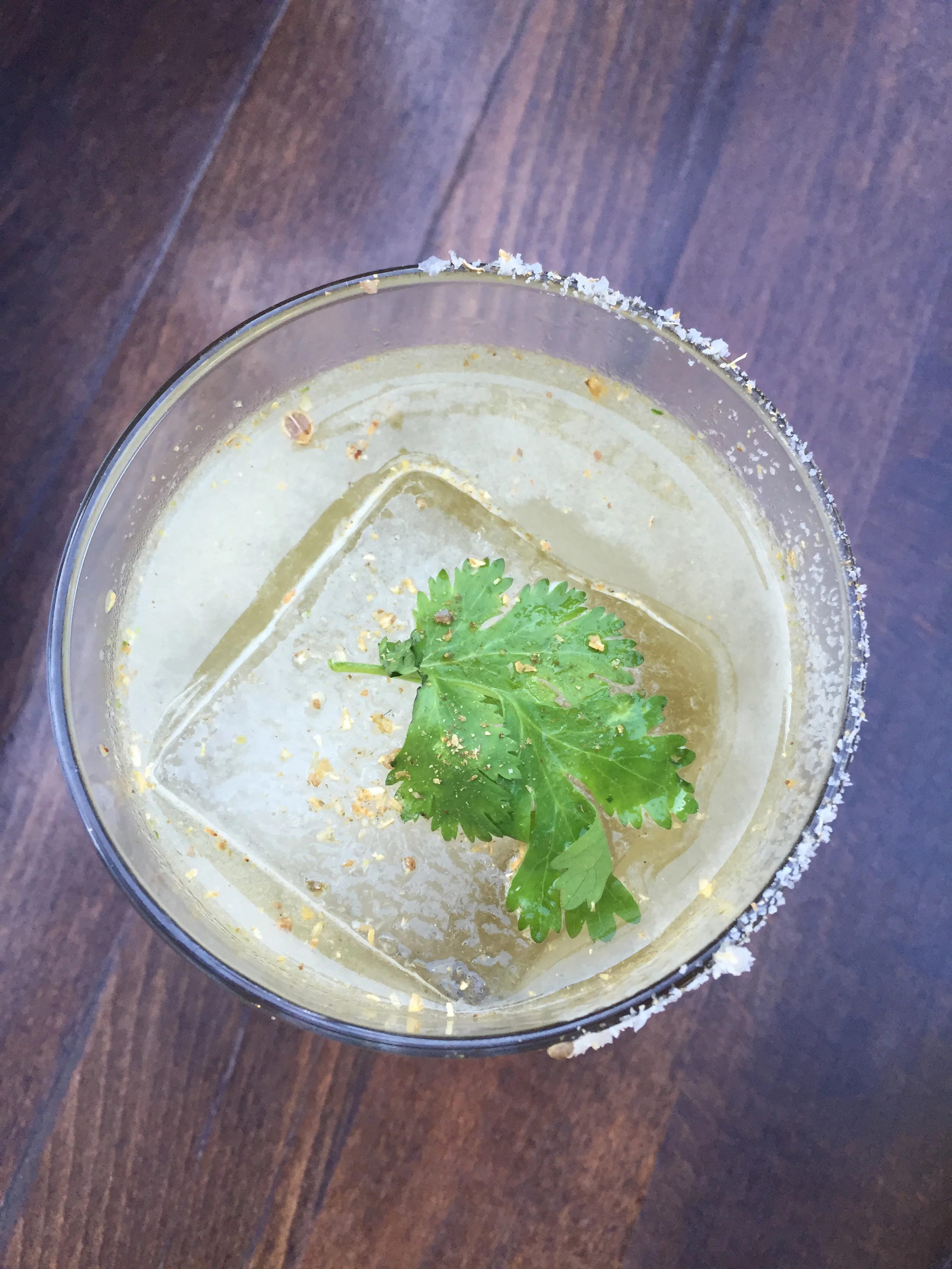 Jazz Man cocktail with serrano infused Epsilon Tequila, house jasmine liqueur, agave, cilantro, and lime.