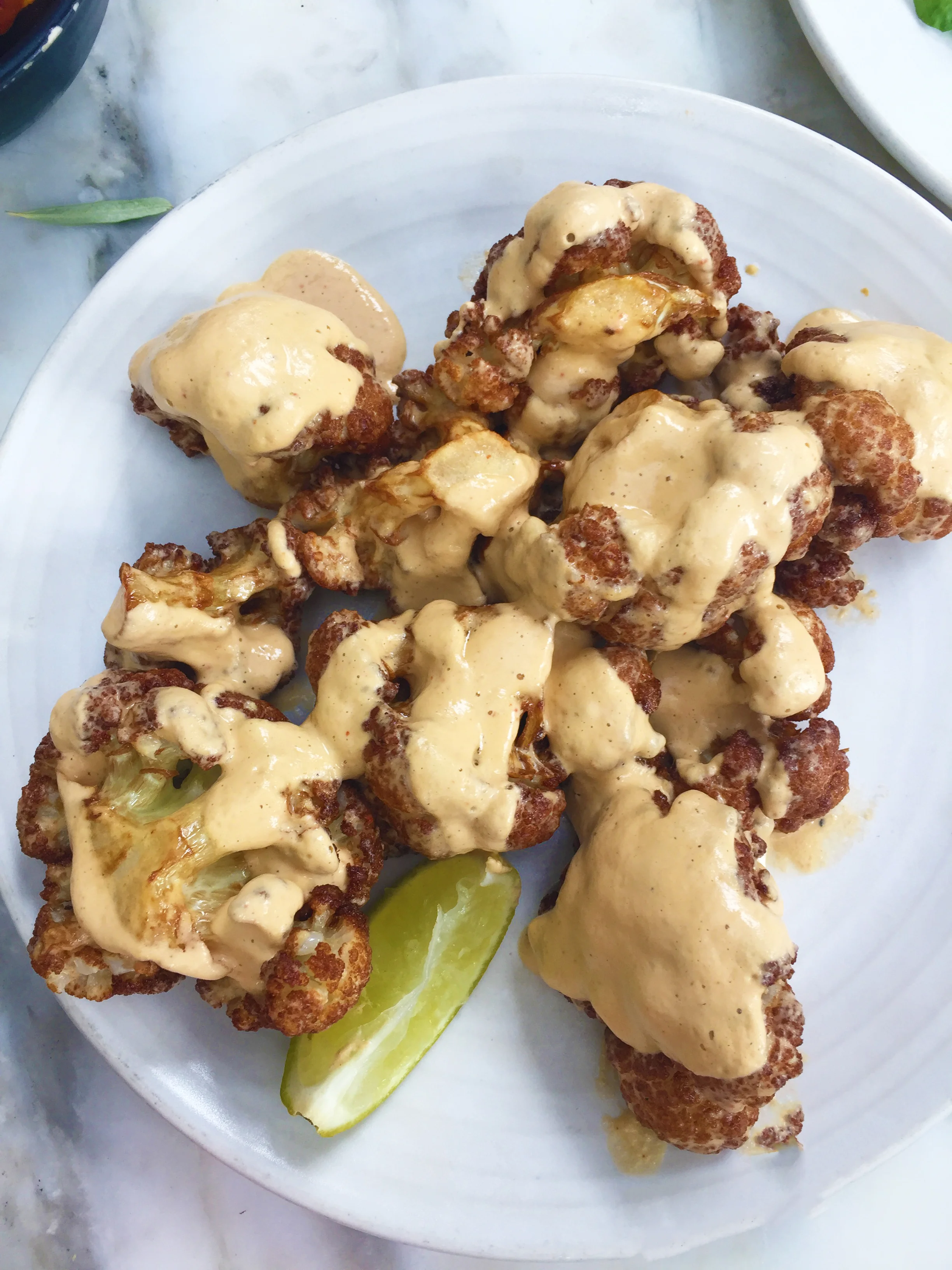 COLIFLÓR FRITO - cauliflower - cashew nacho cheese - lemon