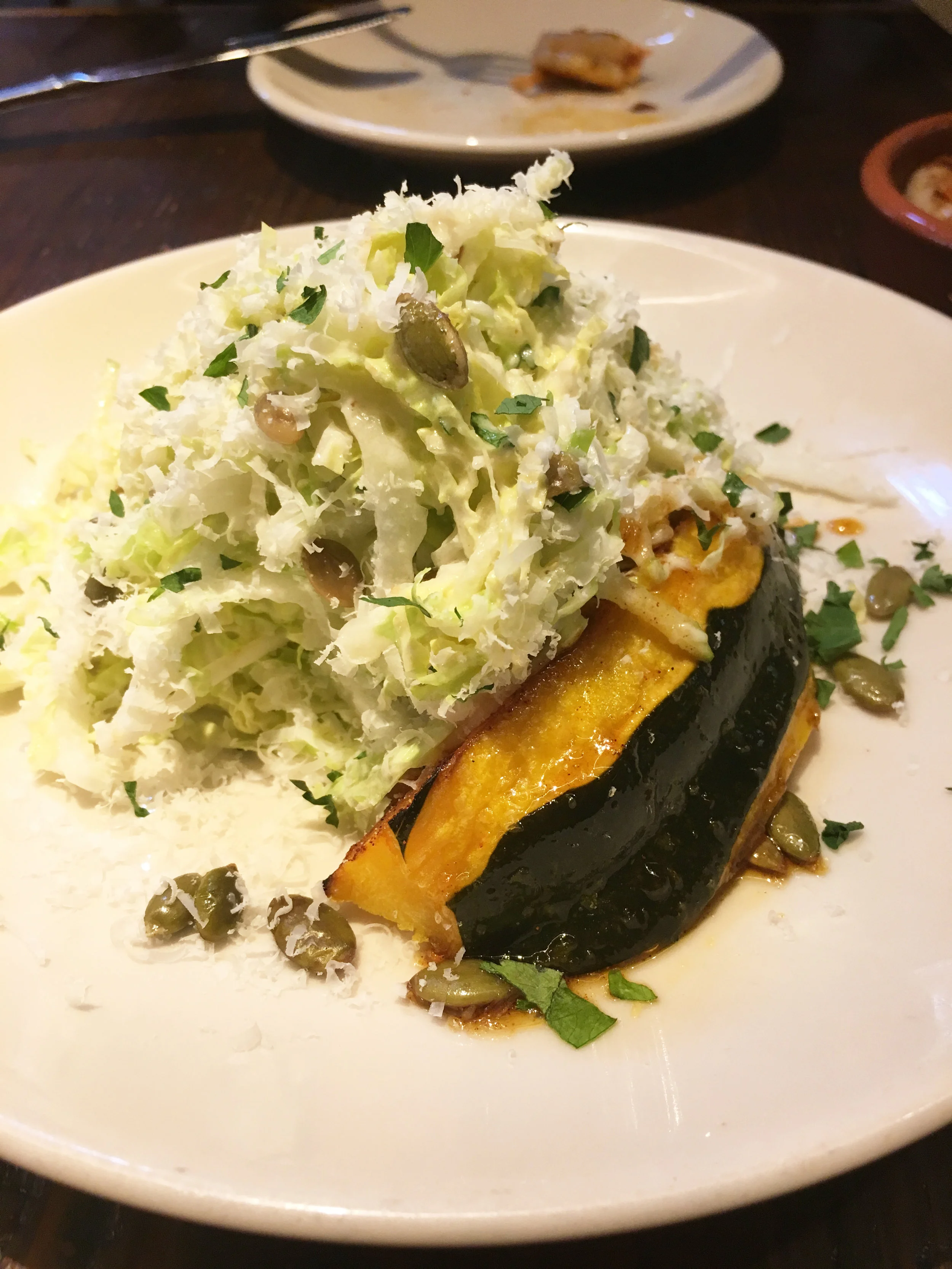 Napa cabbage + apple slaw with creamy shallot-lime vinaigrette, roasted acorn squash, pepitas