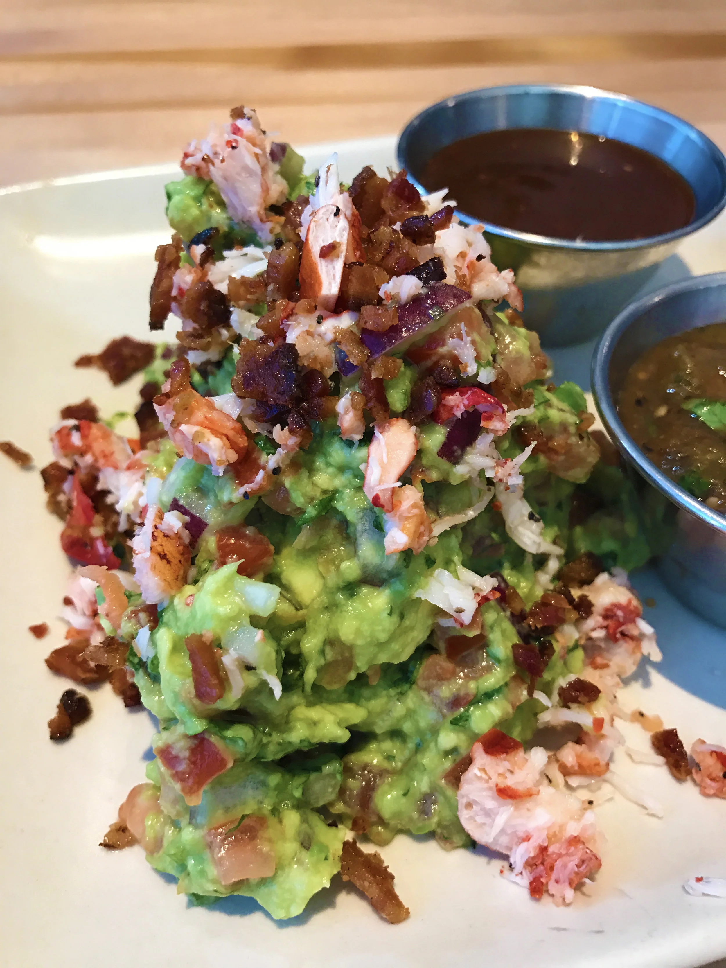 Guacamole with hass avocados, serranos, red onions, cilantro, lobster and nueske bacon