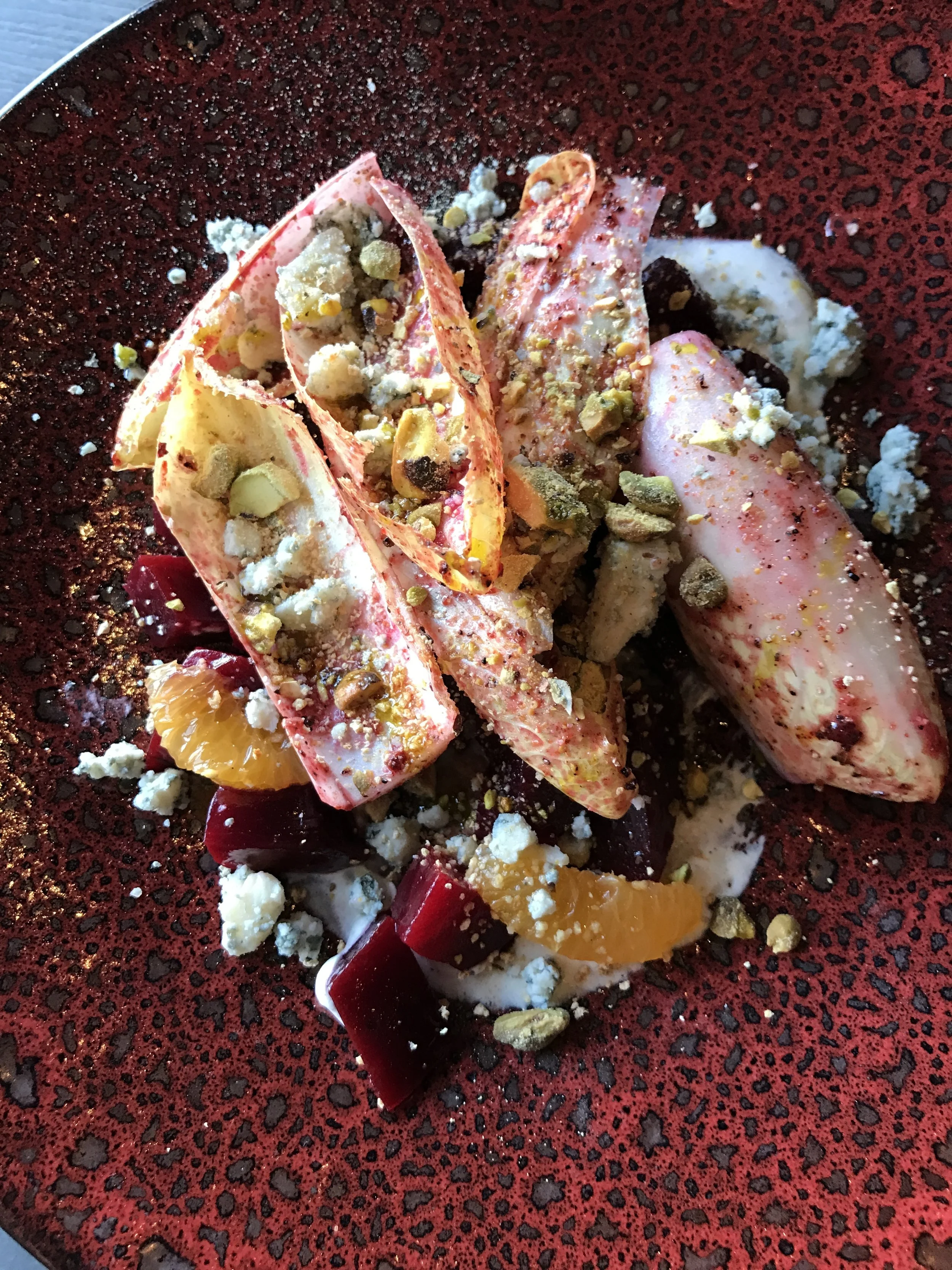 Toasted beets with endive, tangerine, and bleu cheese.