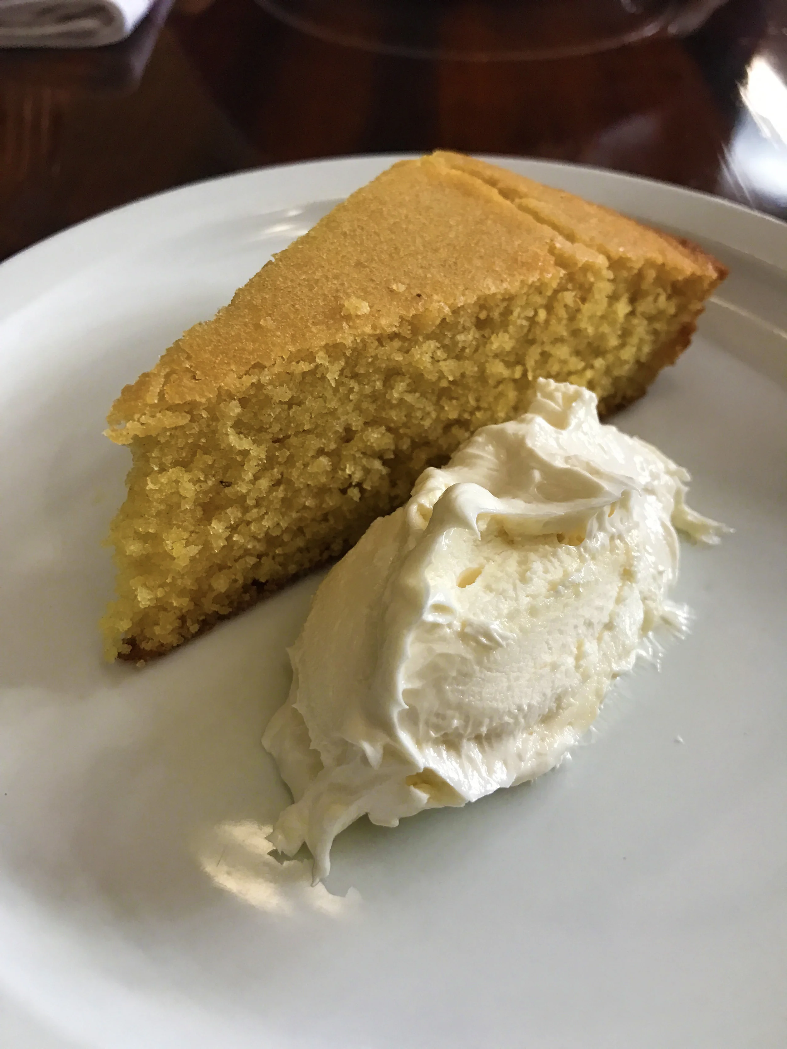 Warm homemade corn bread with whipped honey butter