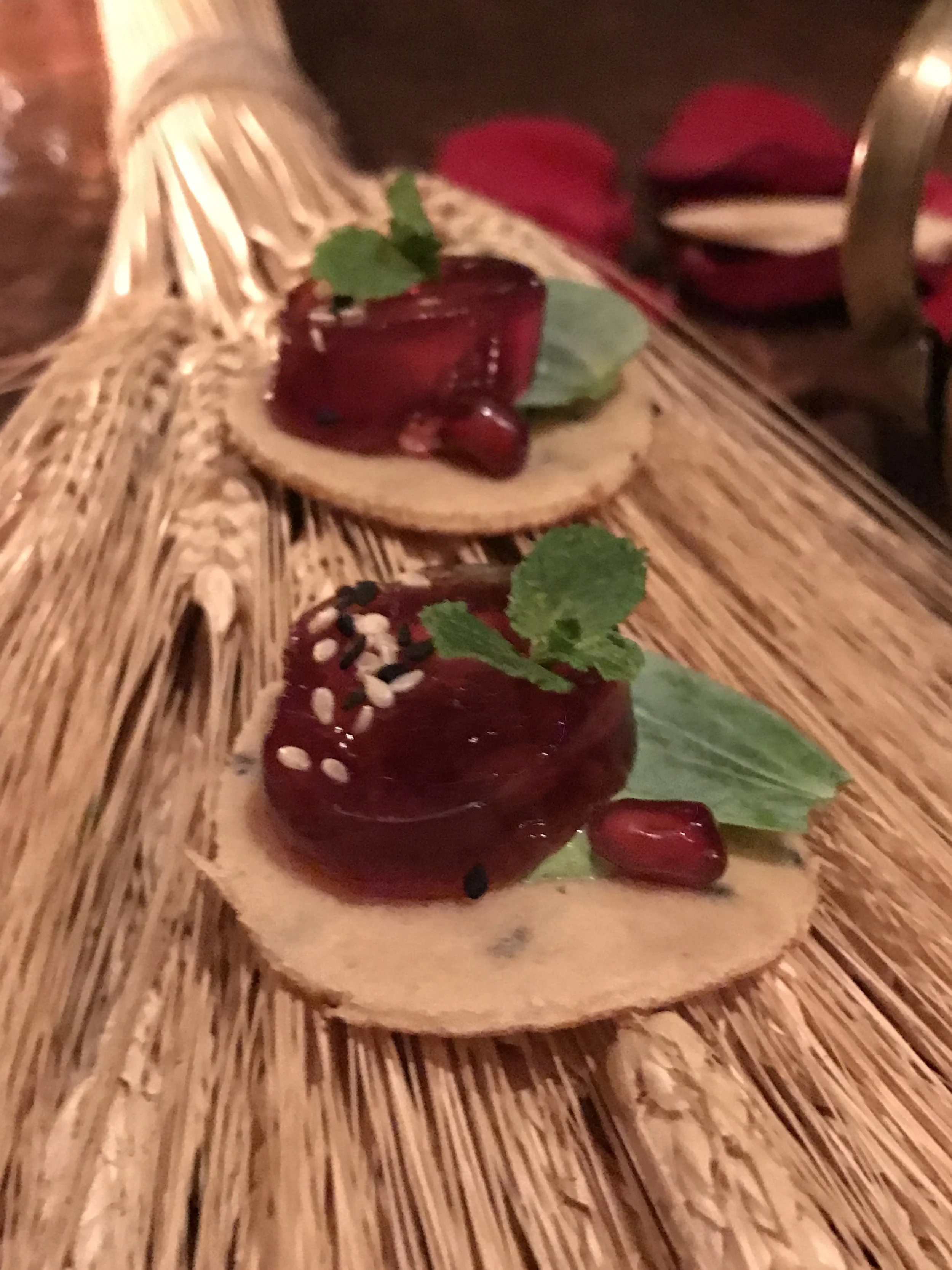 Kamut pancake, oyster, and pomegranate gelee
