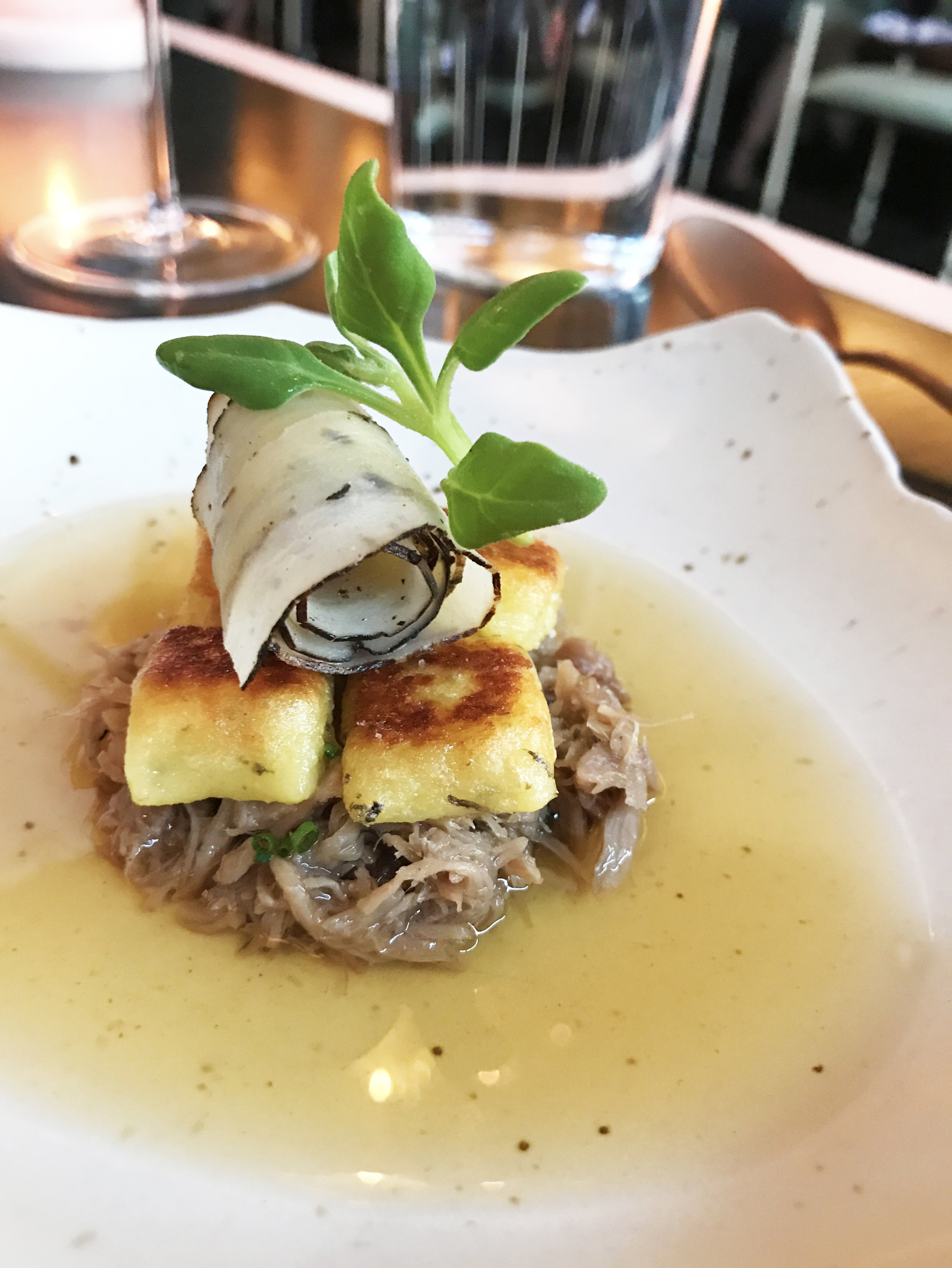 Gnocchi with smoked ham hock, salsify, and black truffle