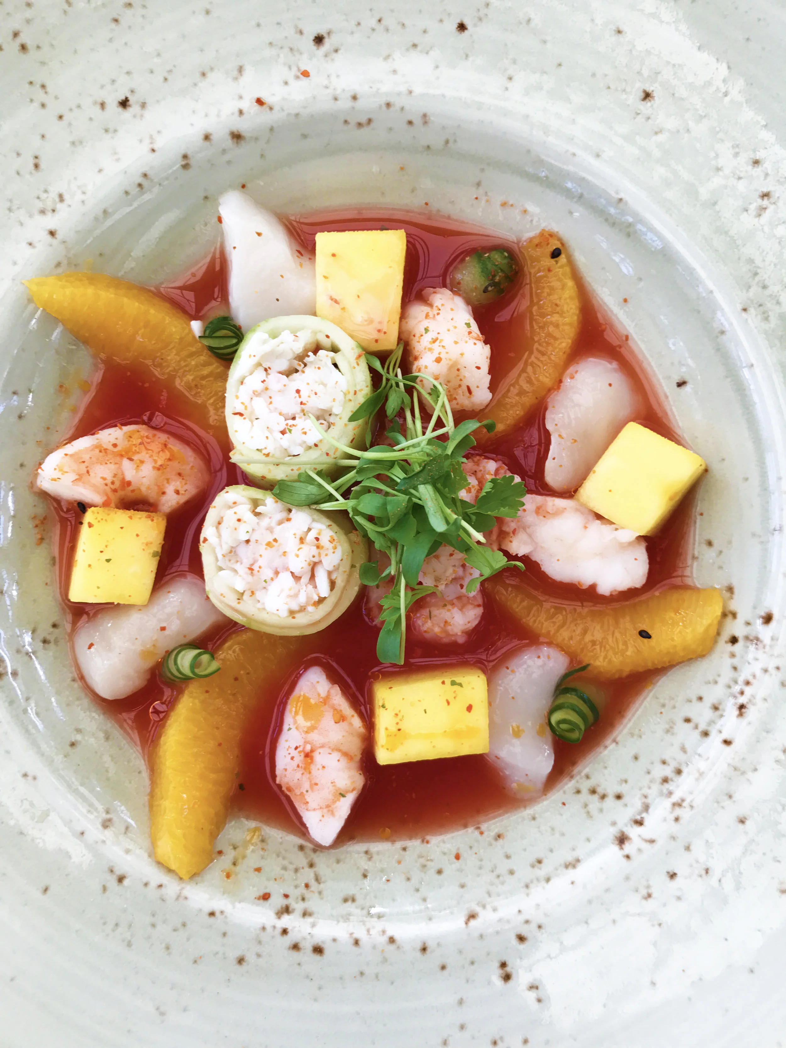 Catch Ceviche with king crab, lobster, shrimp, scallop, mango, blood orange, and ponzu