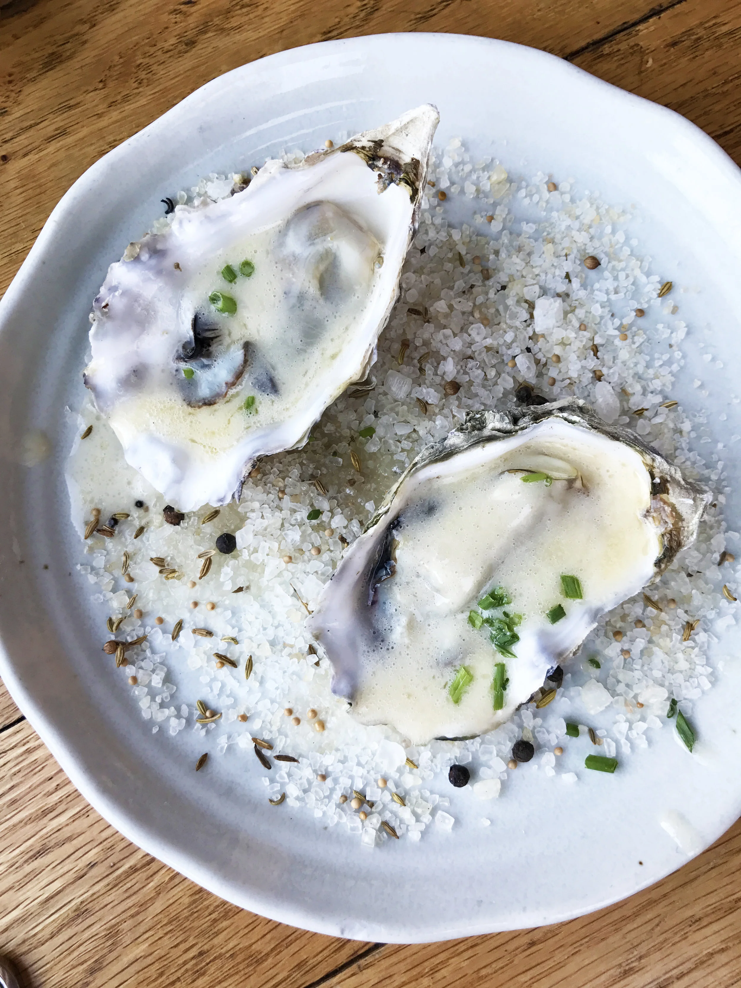 Grilled Fat Bastard oysters with lemon butter and chives