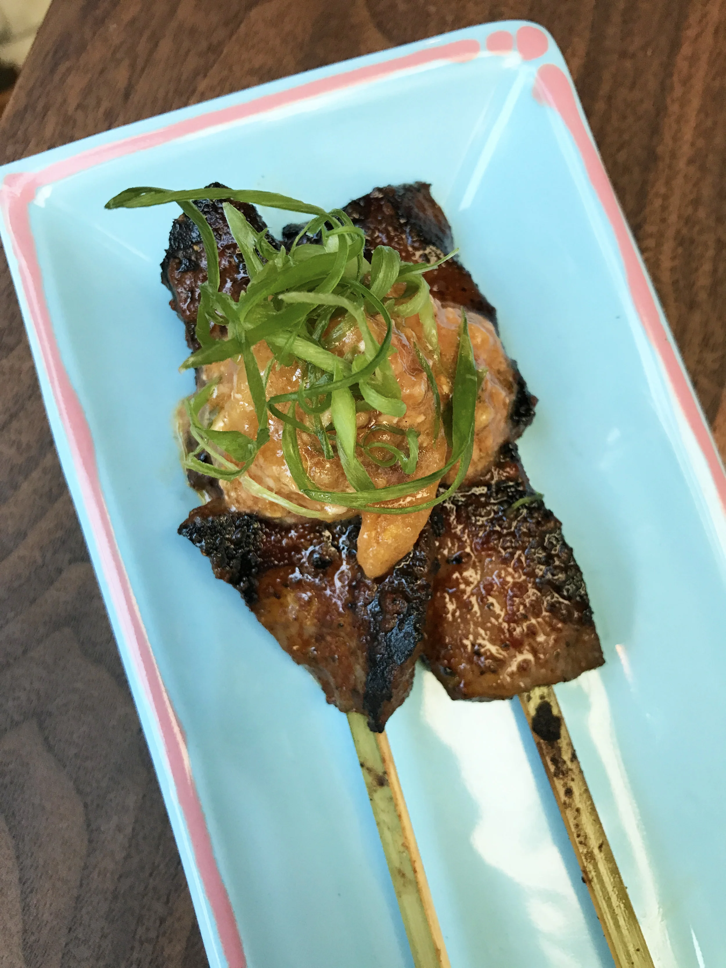 Corazon Anticucho - beef heart skewers, rustic rocoto pepper, feta cheese, walnut sauce