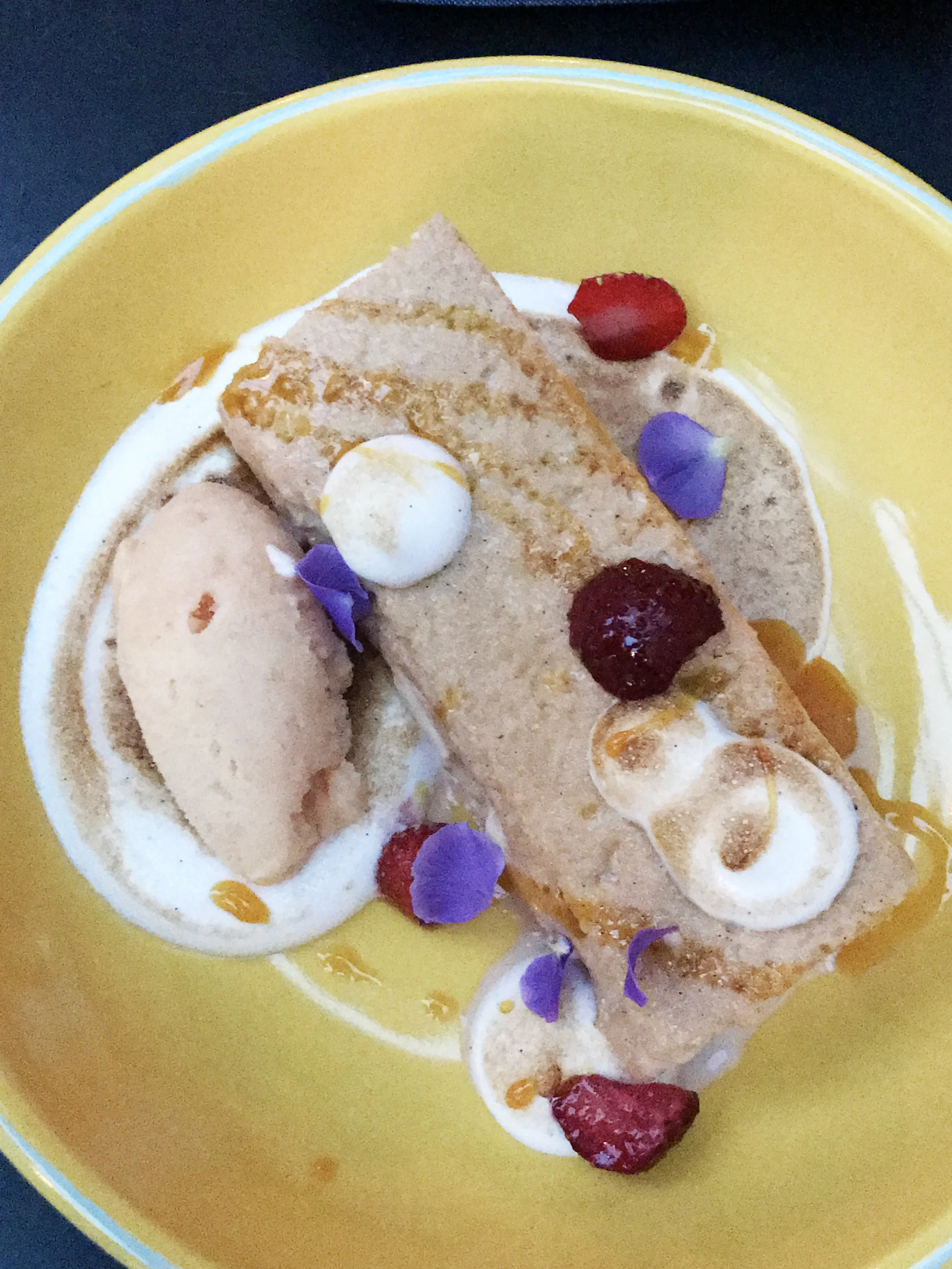 Chanchay Con Leche - Peruvian cake with goat's milk, manjar blanco, coconut milk, maracuya, guava frozen yogurt, torched meringue, and berries.