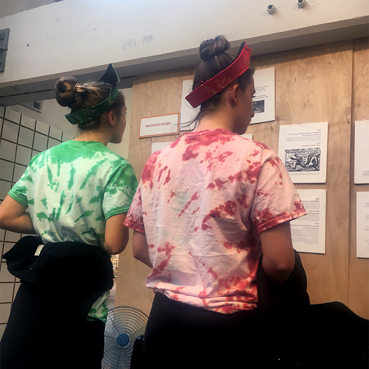 The Royal Court did pay my exhibition a visit. They were quite lovely and polite, with no negative comments. image description: two of the princesses of 2017's Feast of Lantern's royal court are standing in the gallery and reading the timeline.