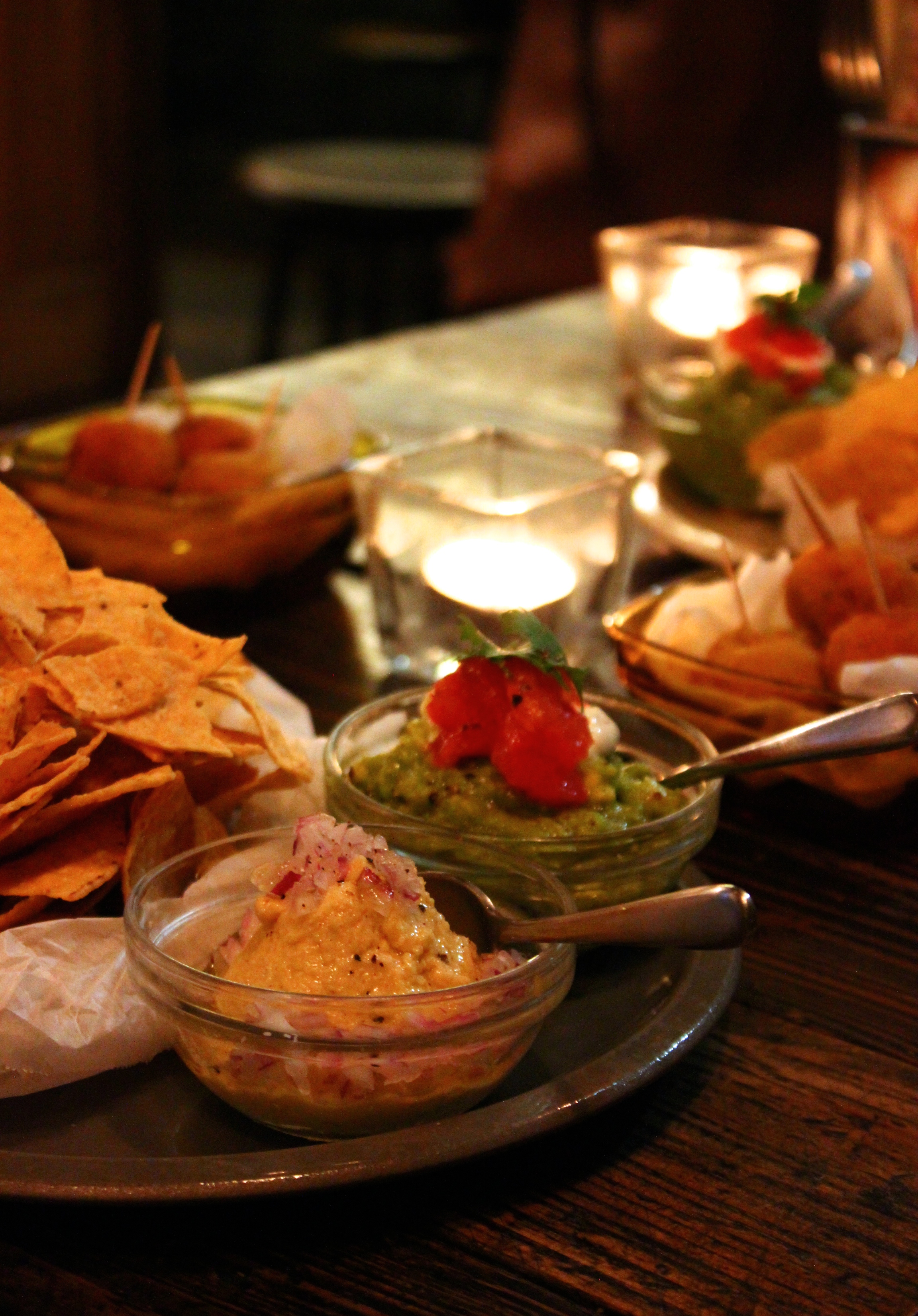 Tortilla chips with wakamore and fummus