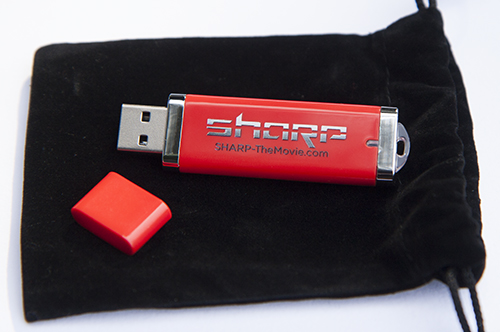 SHARP Flash Drive (ideal for closing gifts) • Containing DRM-free 720P MOV file of SHARP • Comes with black velvet case for protection