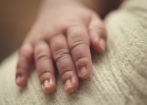 Macro images of newborn girl hands