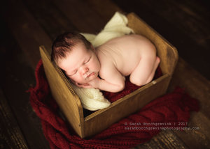 Baby Boy Posed on Vintage Bed