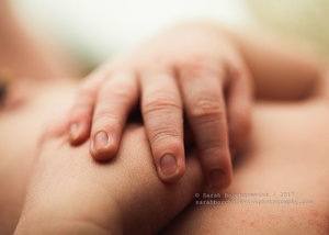 Newborn fingers and hands macro image