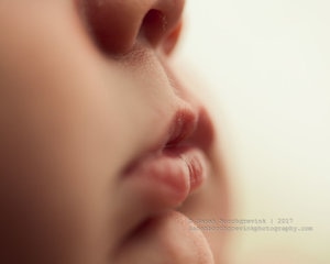 Newborn baby's side profile and lips