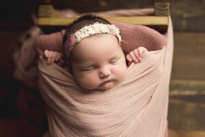 Newborn girl posing