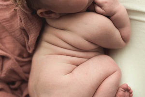 Side sleeper pose with baby rolls