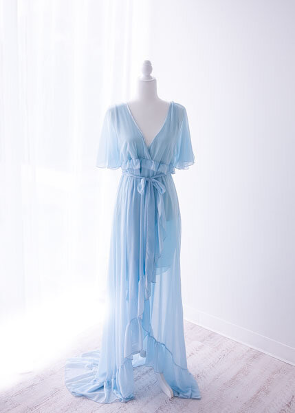 Airy and bright light blue gown for photoshoot