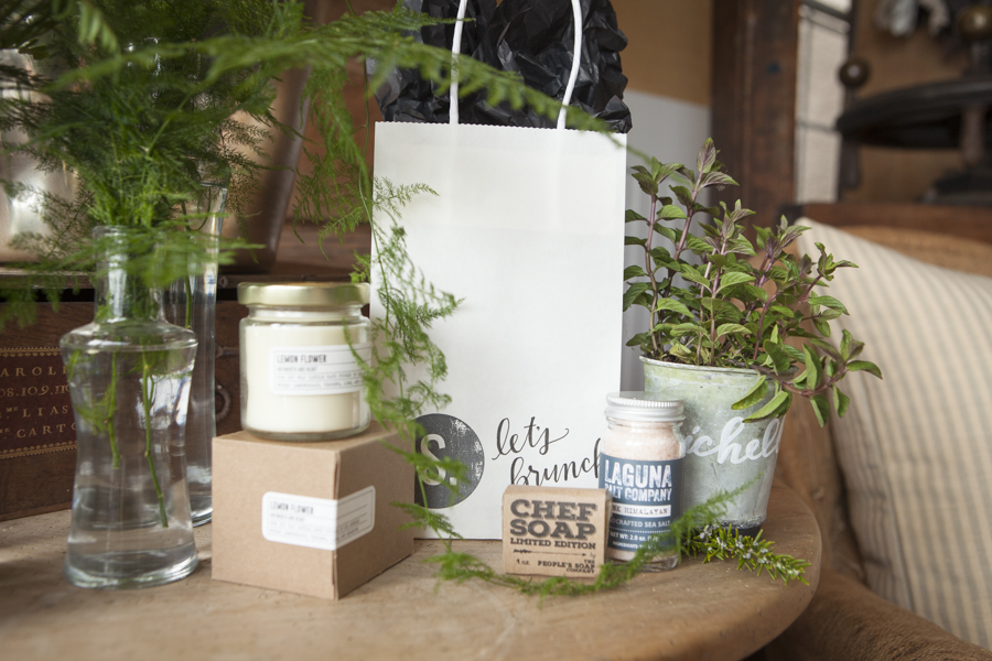  welcome bag with custom stamp and sponsored gifts including candle, chef soap, and artisan salt // SOURCED. laguna beach 