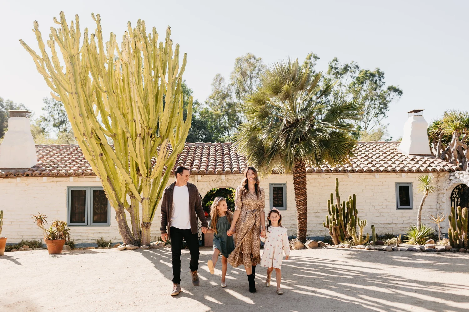 Claire and Ryan Danz, Air Concierge co-founders, walking with their family