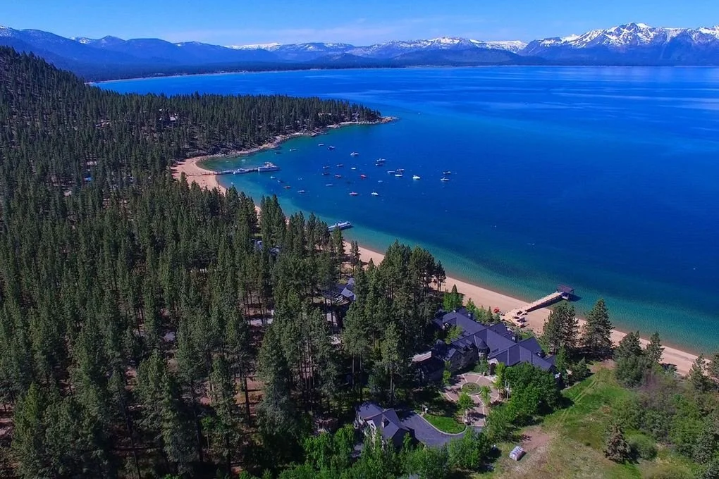 Lake Tahoe’s blue shoreline and forested mountain landscape