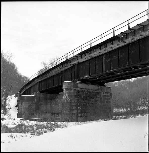 Ken-Bruggeman-Photography-York-PA-Fine-Art-Snow-Train-Bridge-Black-White.jpg