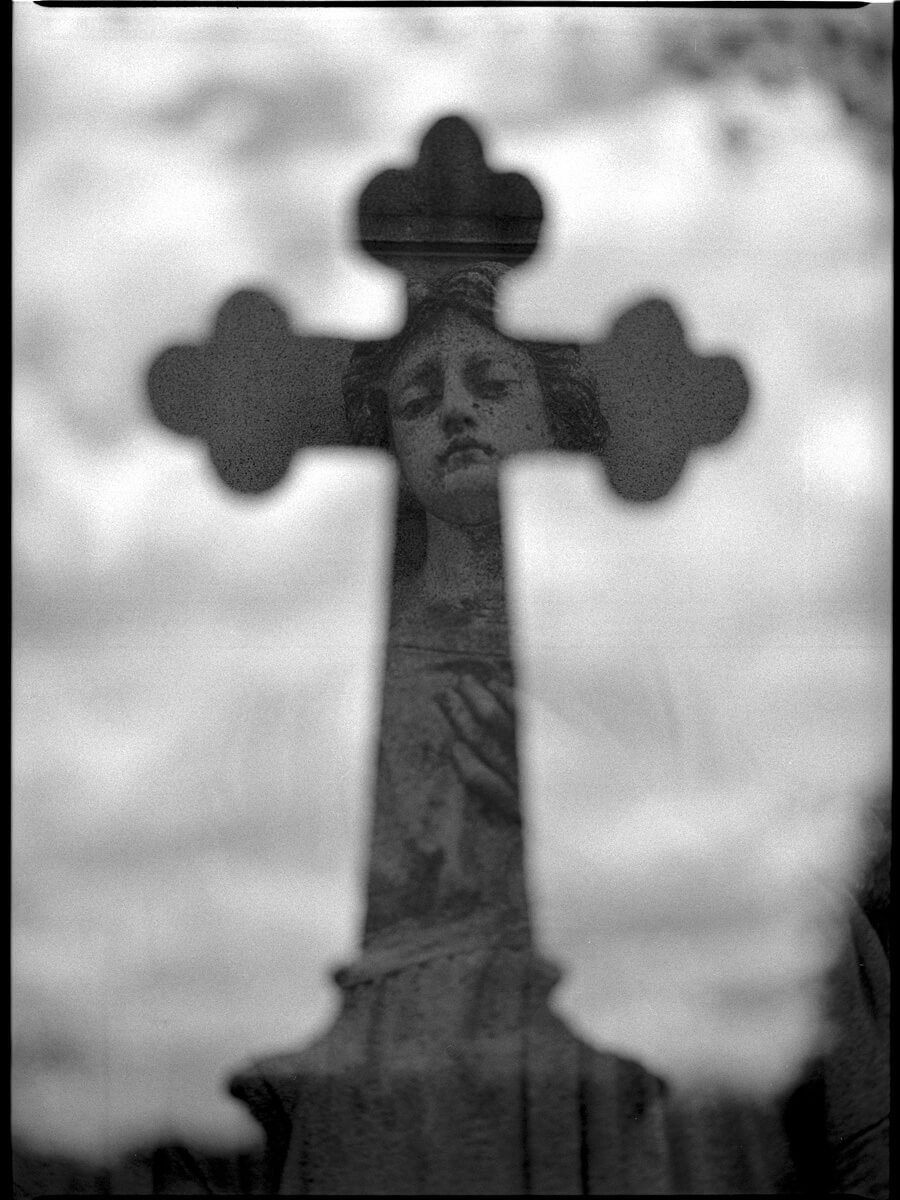 Another double exposure. The first exposure is of a cross shot out of focus to create a "reflective feel" and the 2nd a beautiful statue. A further explanation of this shot on my instagram feed. @kenbruggeman