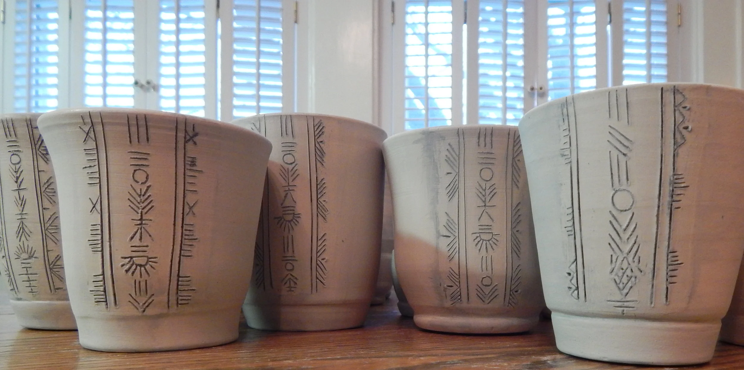 PotteryMugsMishima.jpg