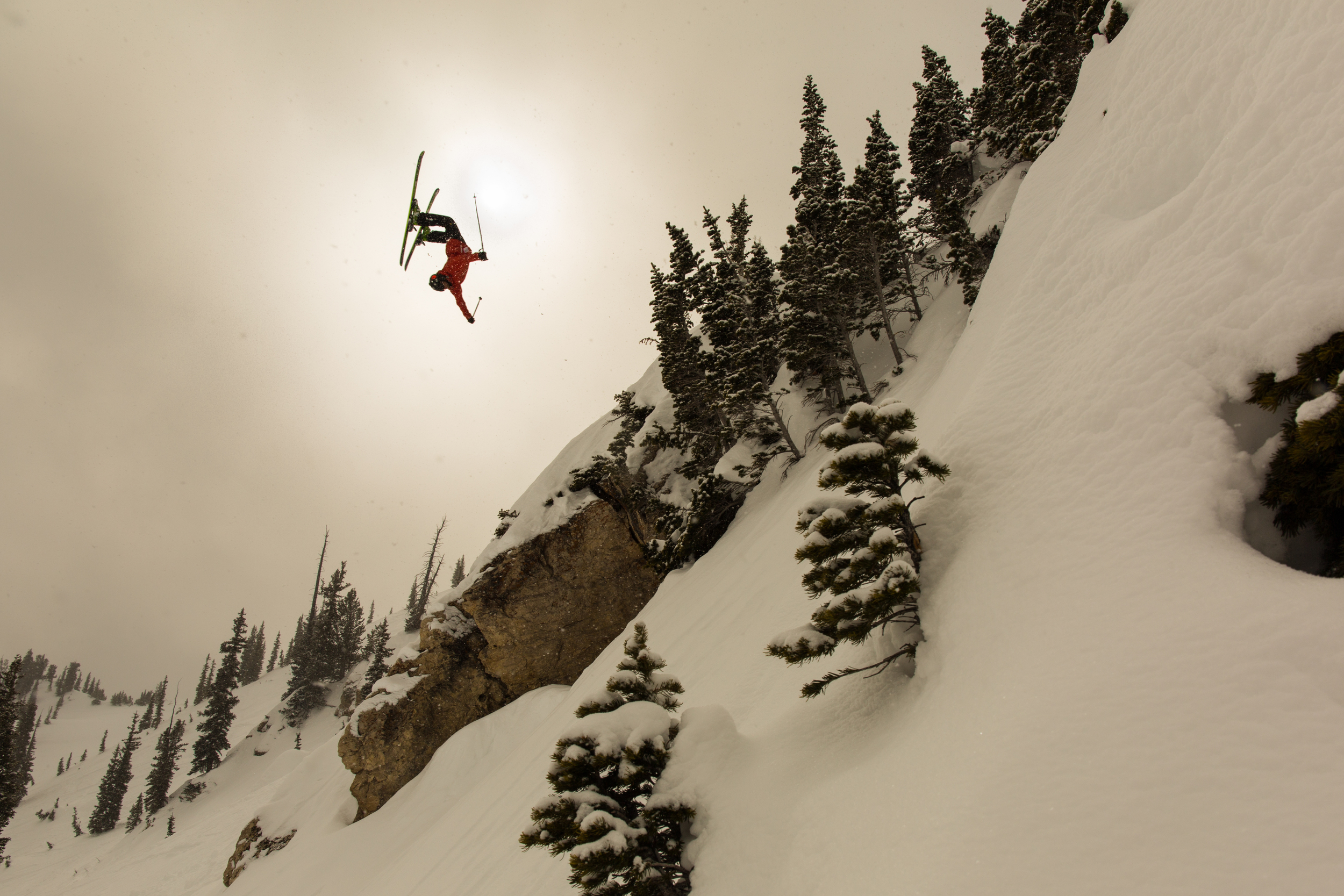 Tyson Rider backflipping C-Frame in the Alta Backcountry