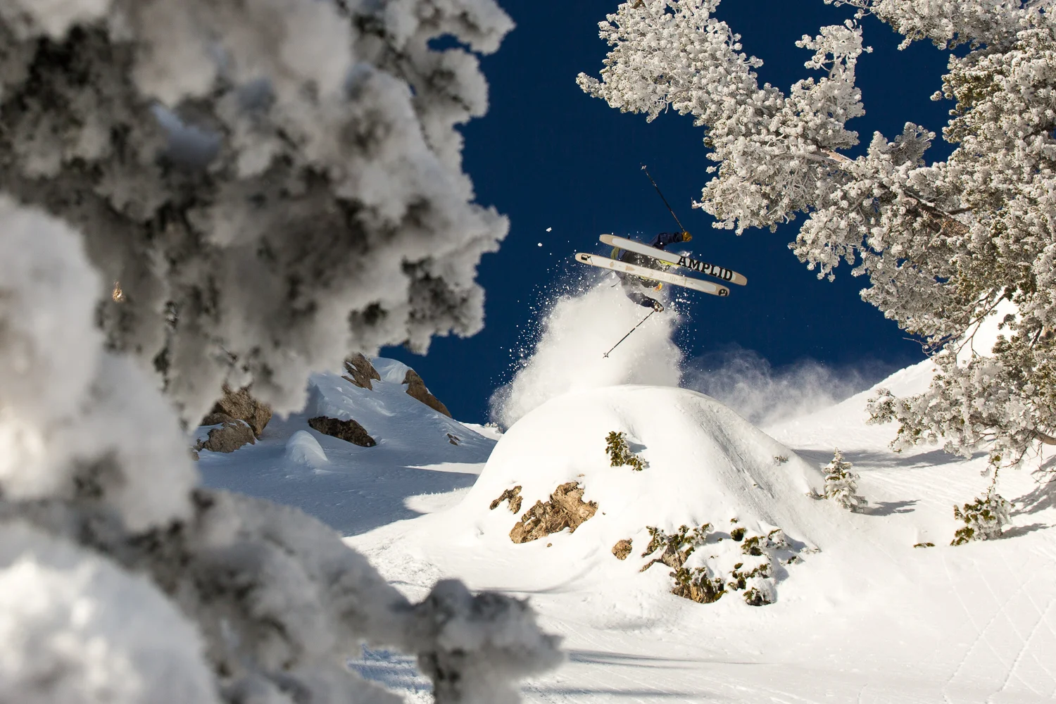Jonnie Merrill throwing a cork 3 in Rocky Point at Alta, Utah