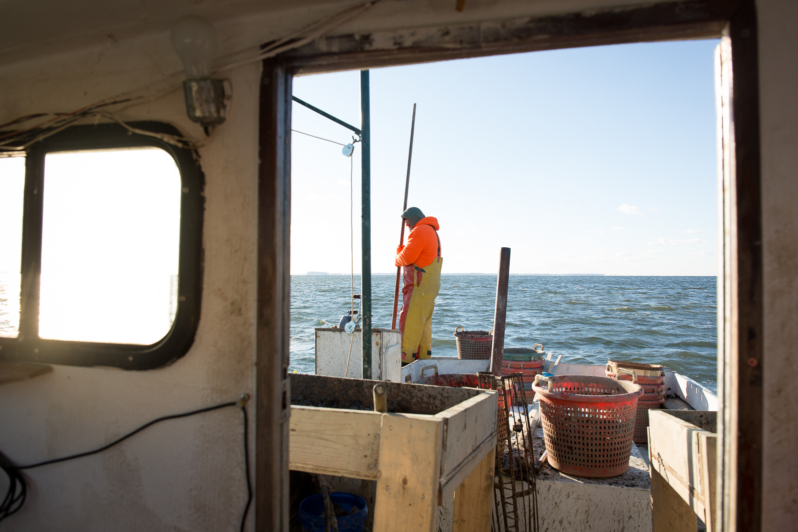 Waterman Chuck Collier and his father on the Chesapeake Bay near Kent Island, MD