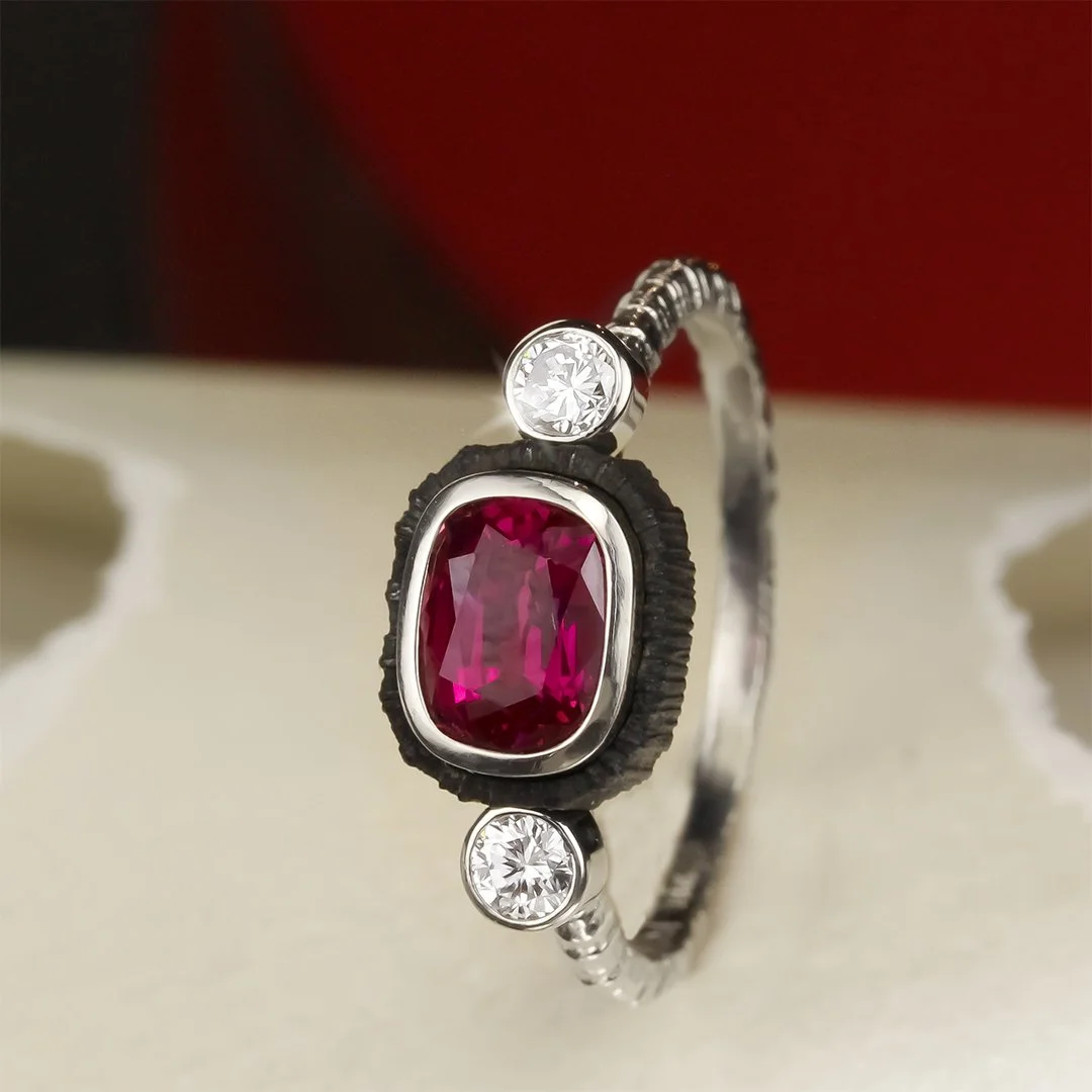 chroma_ring_three_stone_ruby_cushion.jpg